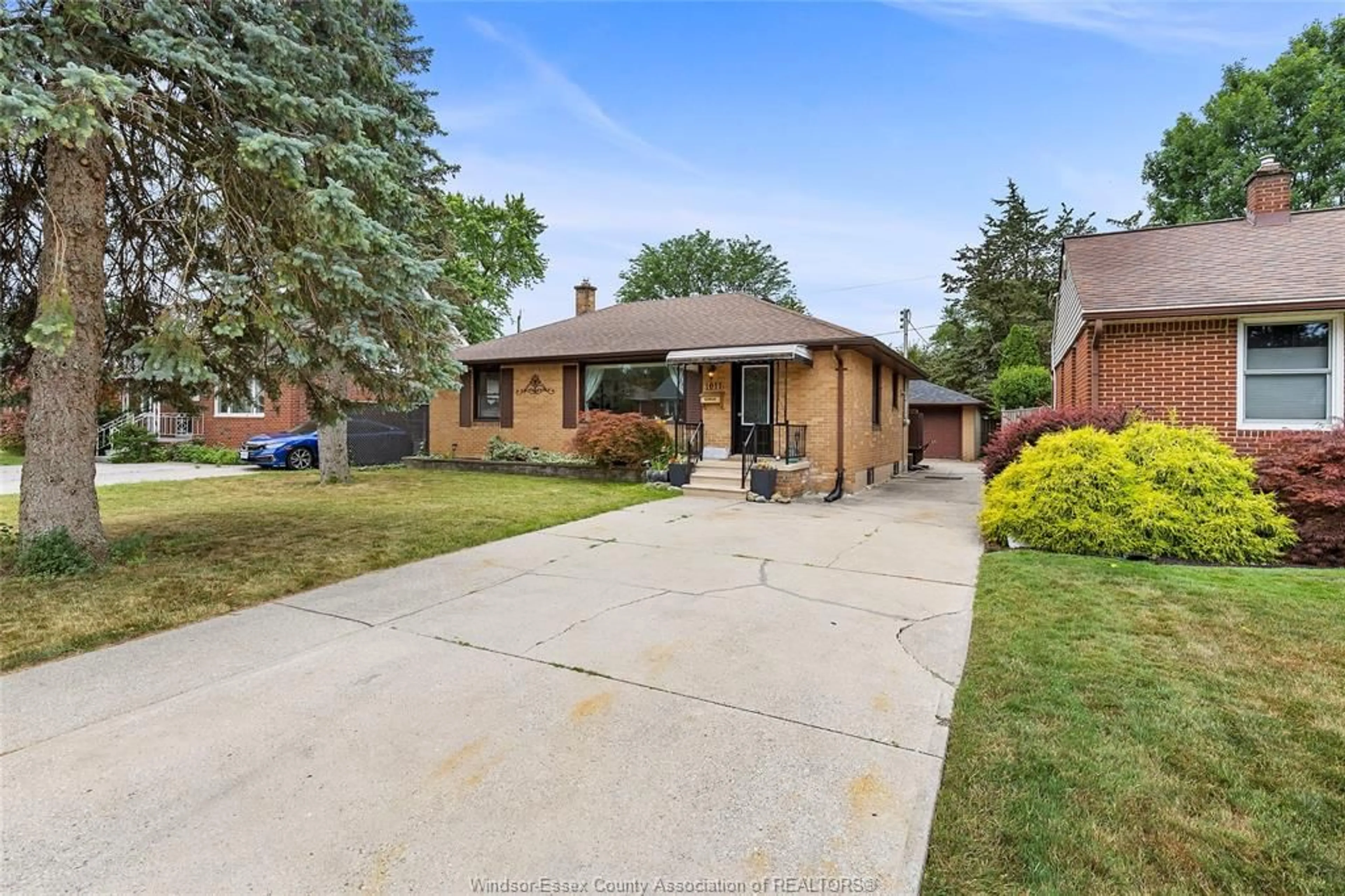 Home with brick exterior material, street for 1011 ISABELLE Pl, Windsor Ontario N8S 3B1