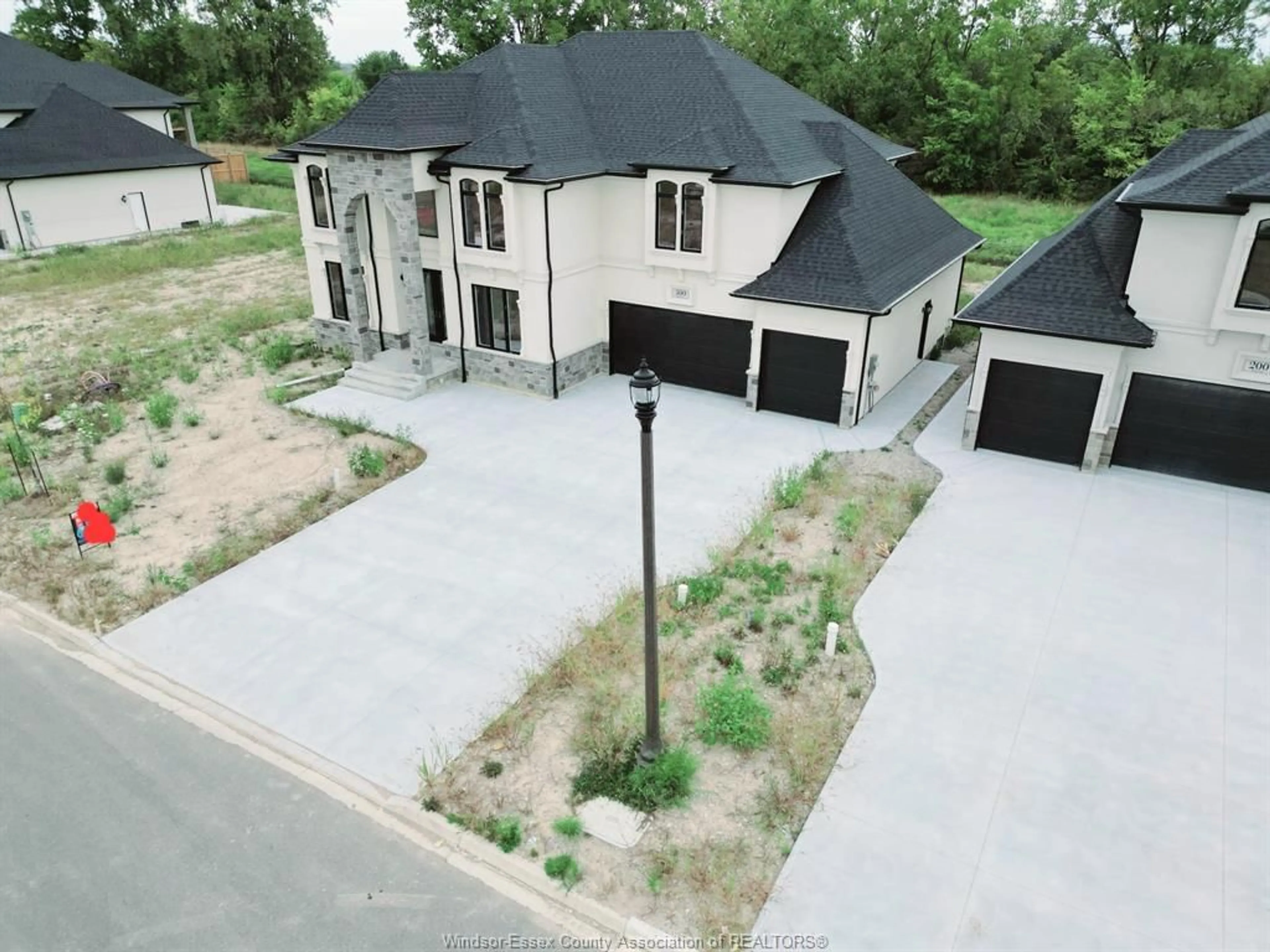 A pic from outside/outdoor area/front of a property/back of a property/a pic from drone, street for 300 BENSON Crt, Amherstburg Ontario N9V 0B9