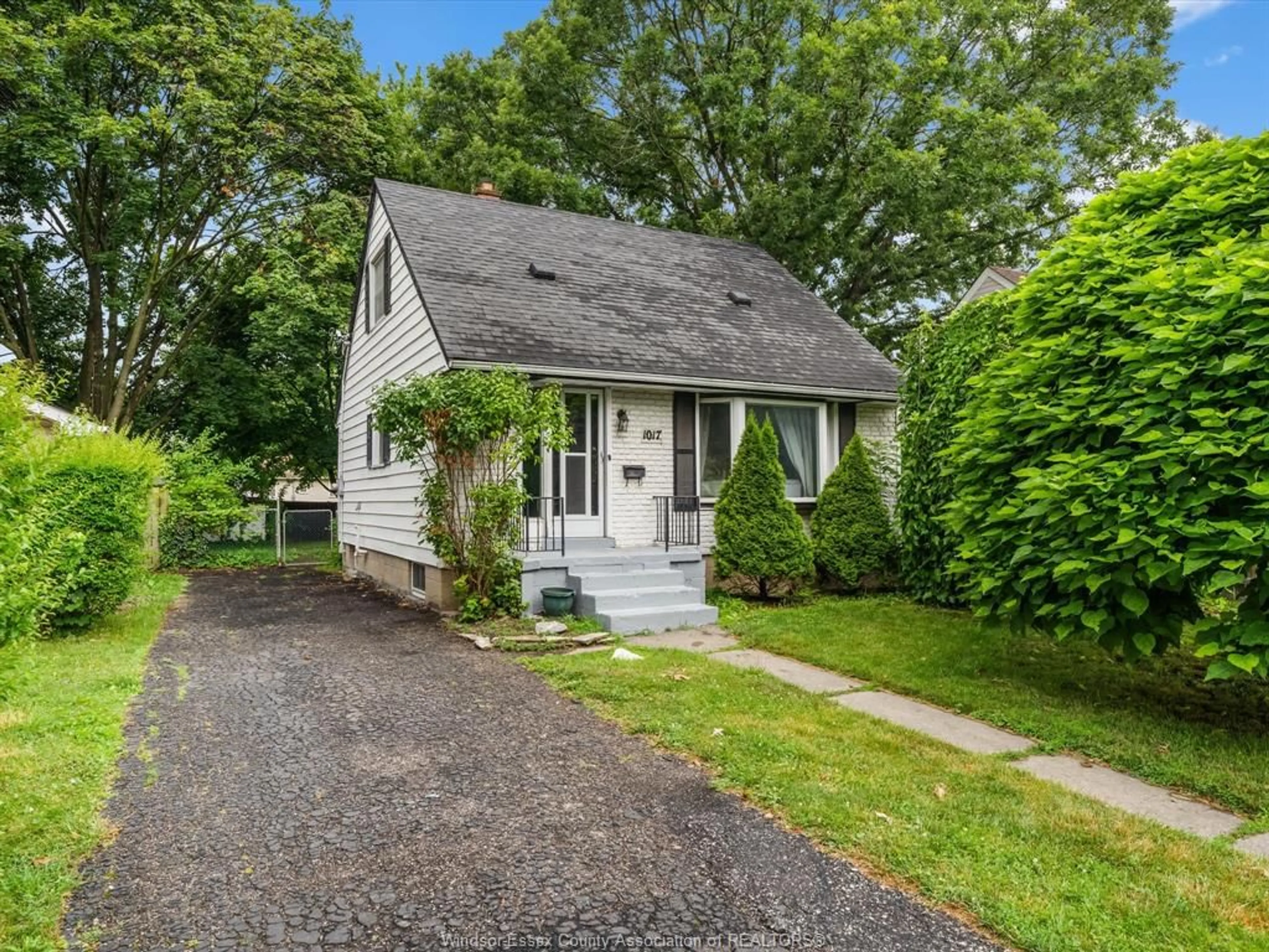 Home with vinyl exterior material, street for 1017 Merritt Dr, Windsor Ontario N9B 3G5