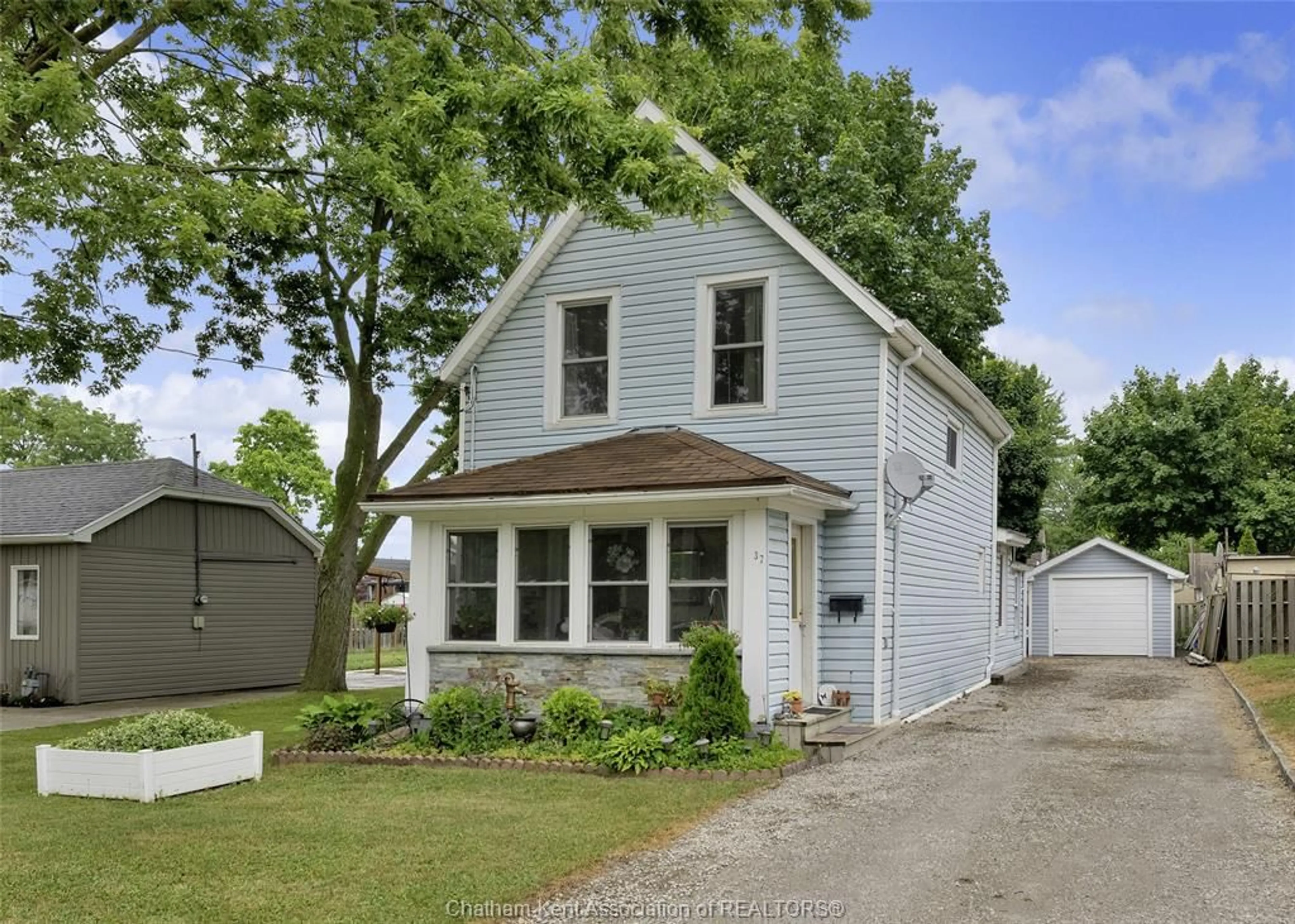 Home with vinyl exterior material, street for 37 Berry St, Chatham Ontario N7M 3B2