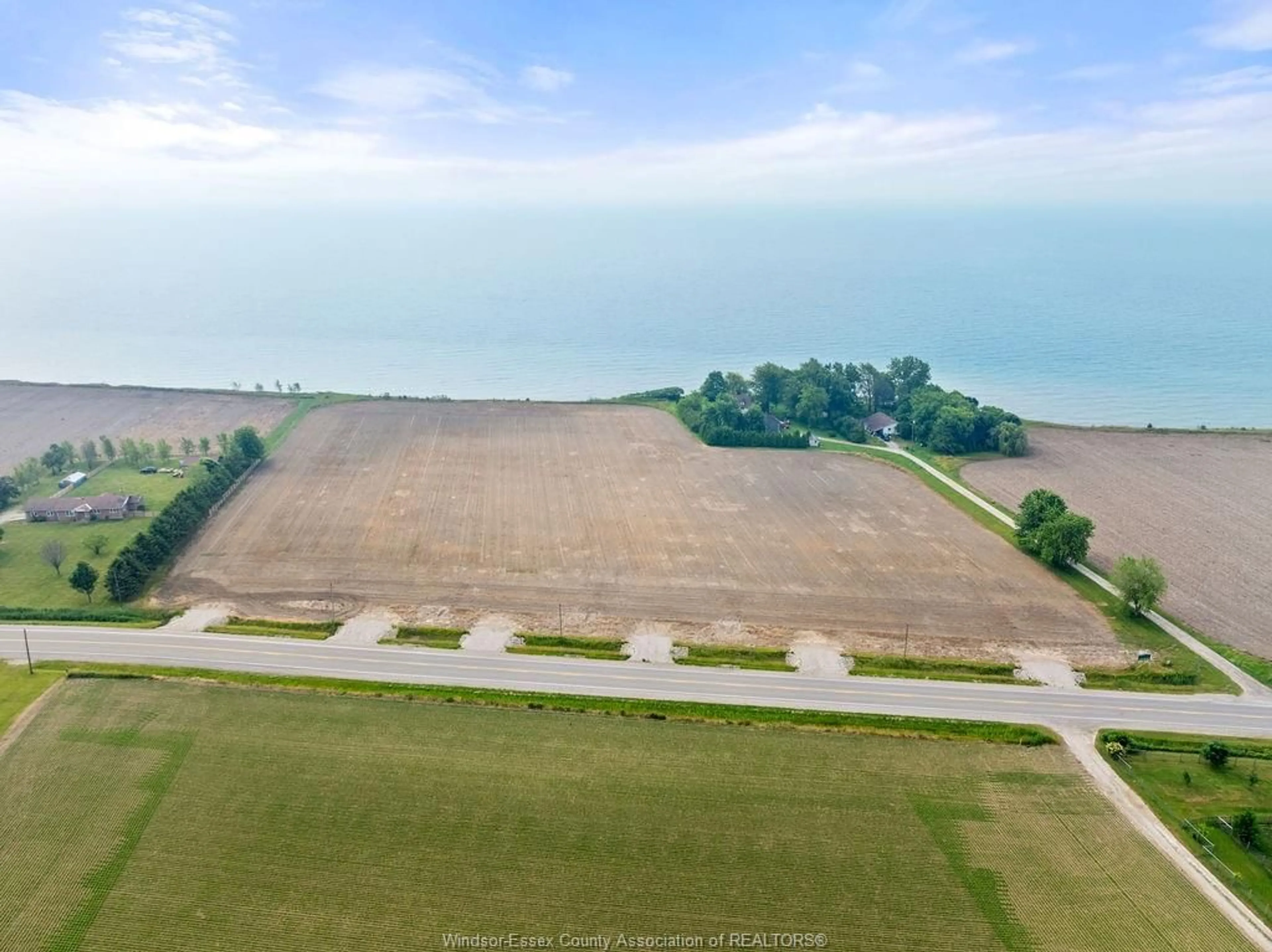 A pic from outside/outdoor area/front of a property/back of a property/a pic from drone, water/lake/river/ocean view for 2320 CEDAR Rd, Wheatley Ontario N0P 2P0