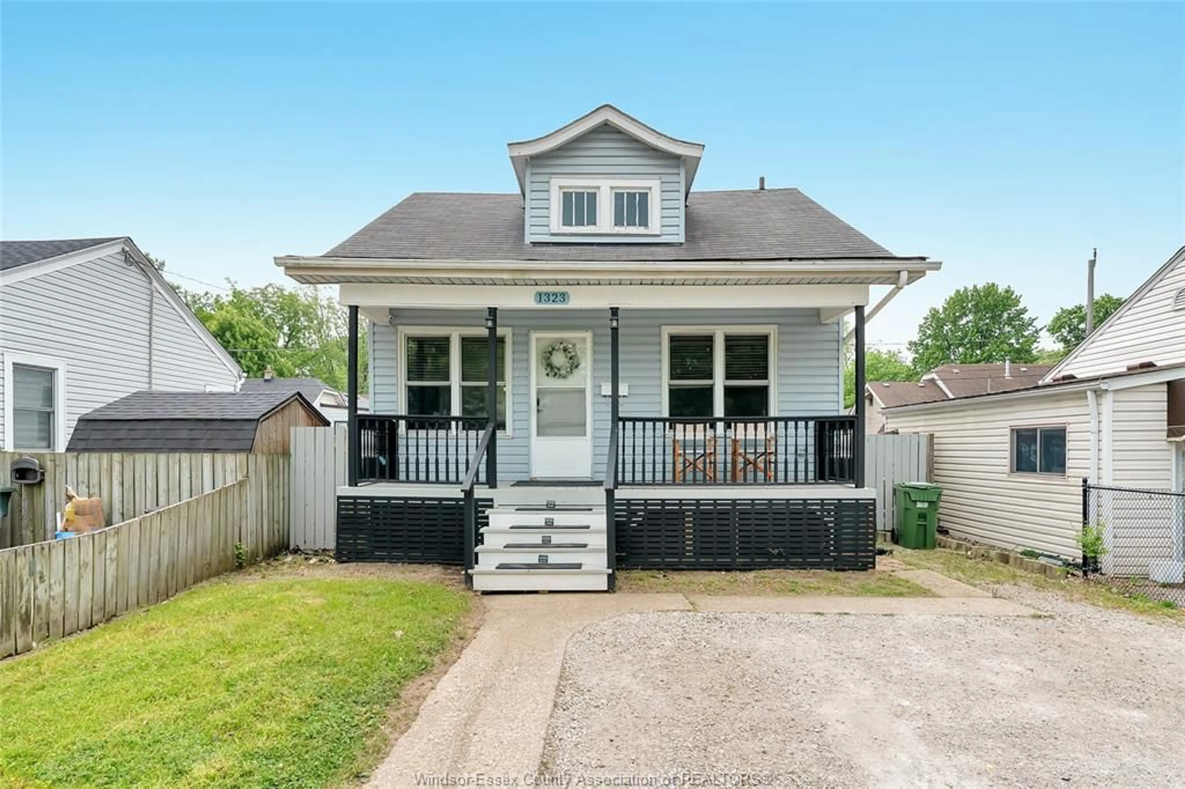 Home with vinyl exterior material, street for 1323 PRINCE Rd, Windsor Ontario N9C 3A5
