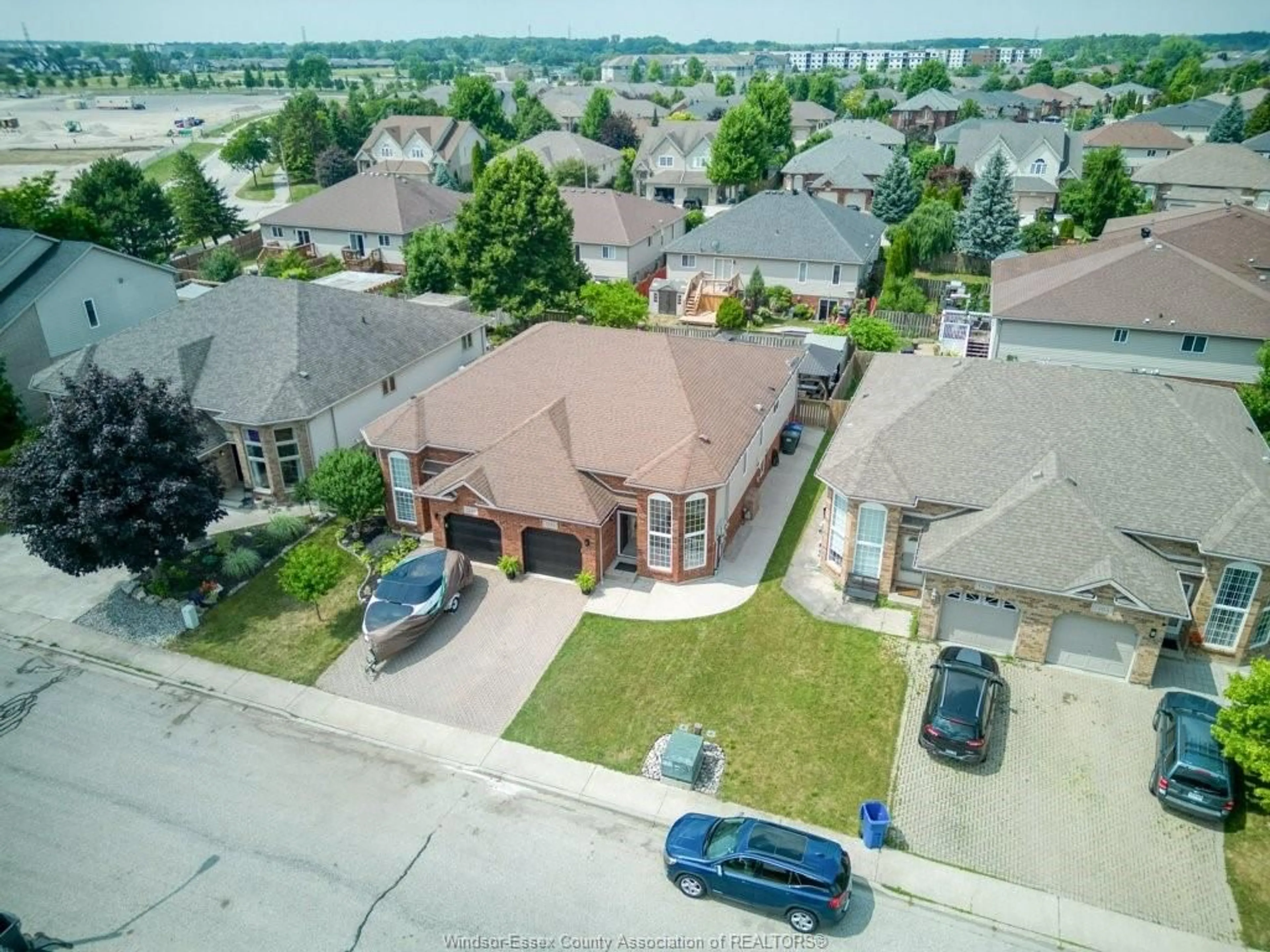 A pic from outside/outdoor area/front of a property/back of a property/a pic from drone, street for 1555 Lovell Cres, LaSalle Ontario N9H 2M8