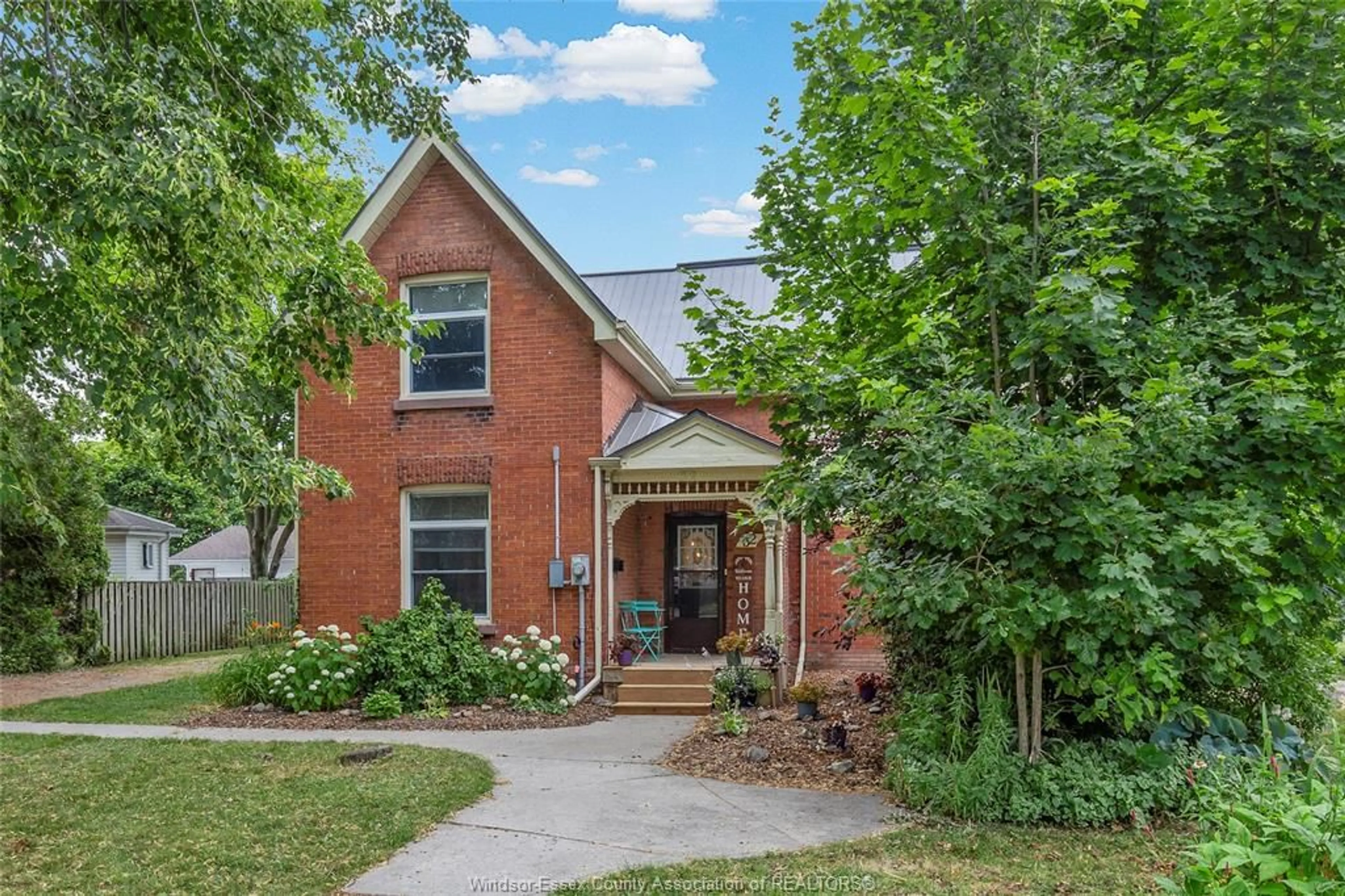 Home with brick exterior material, street for 32 CANAL St, Tilbury Ontario N0P 2L0