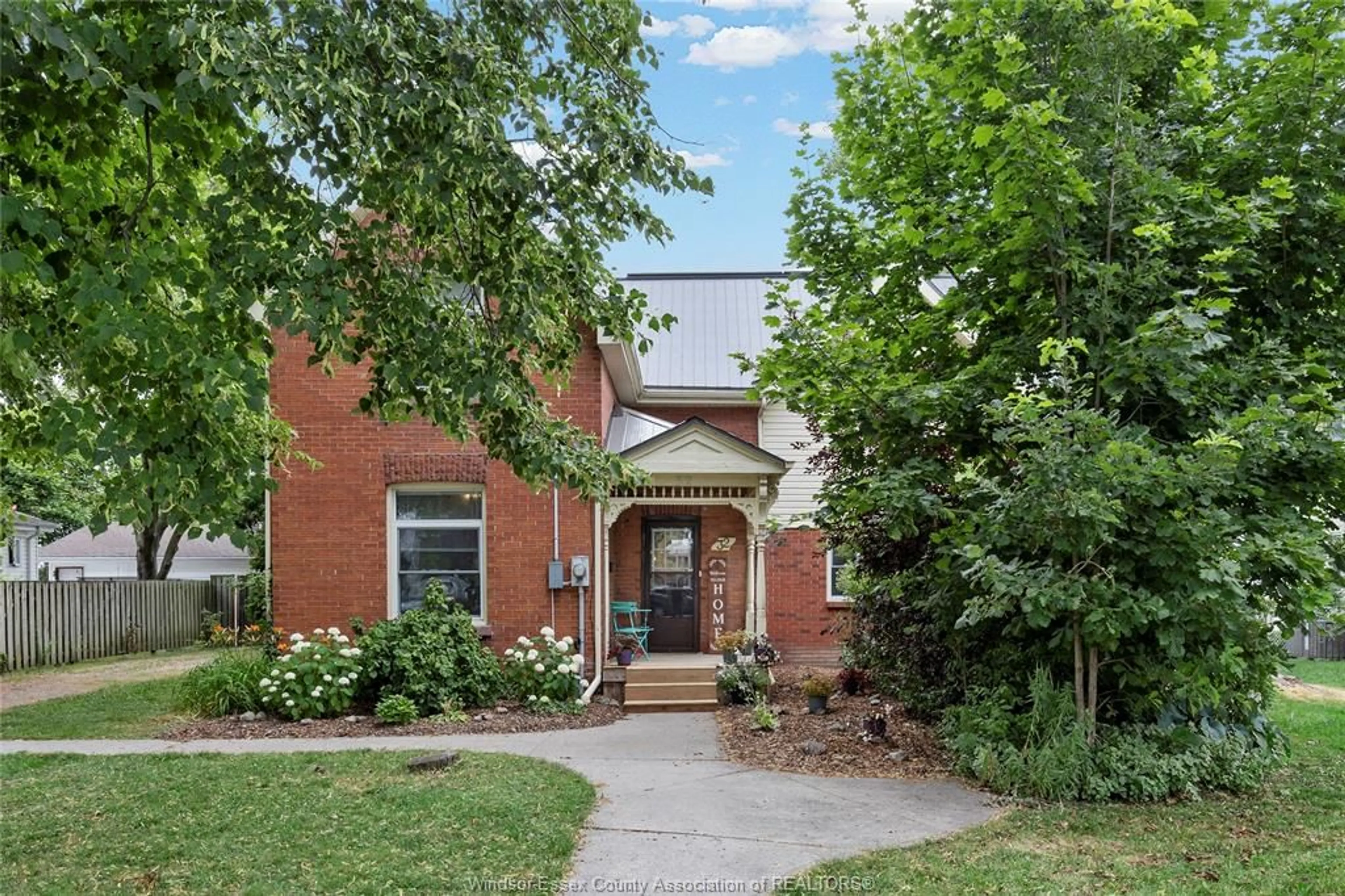 Home with brick exterior material, street for 32 CANAL St, Tilbury Ontario N0P 2L0