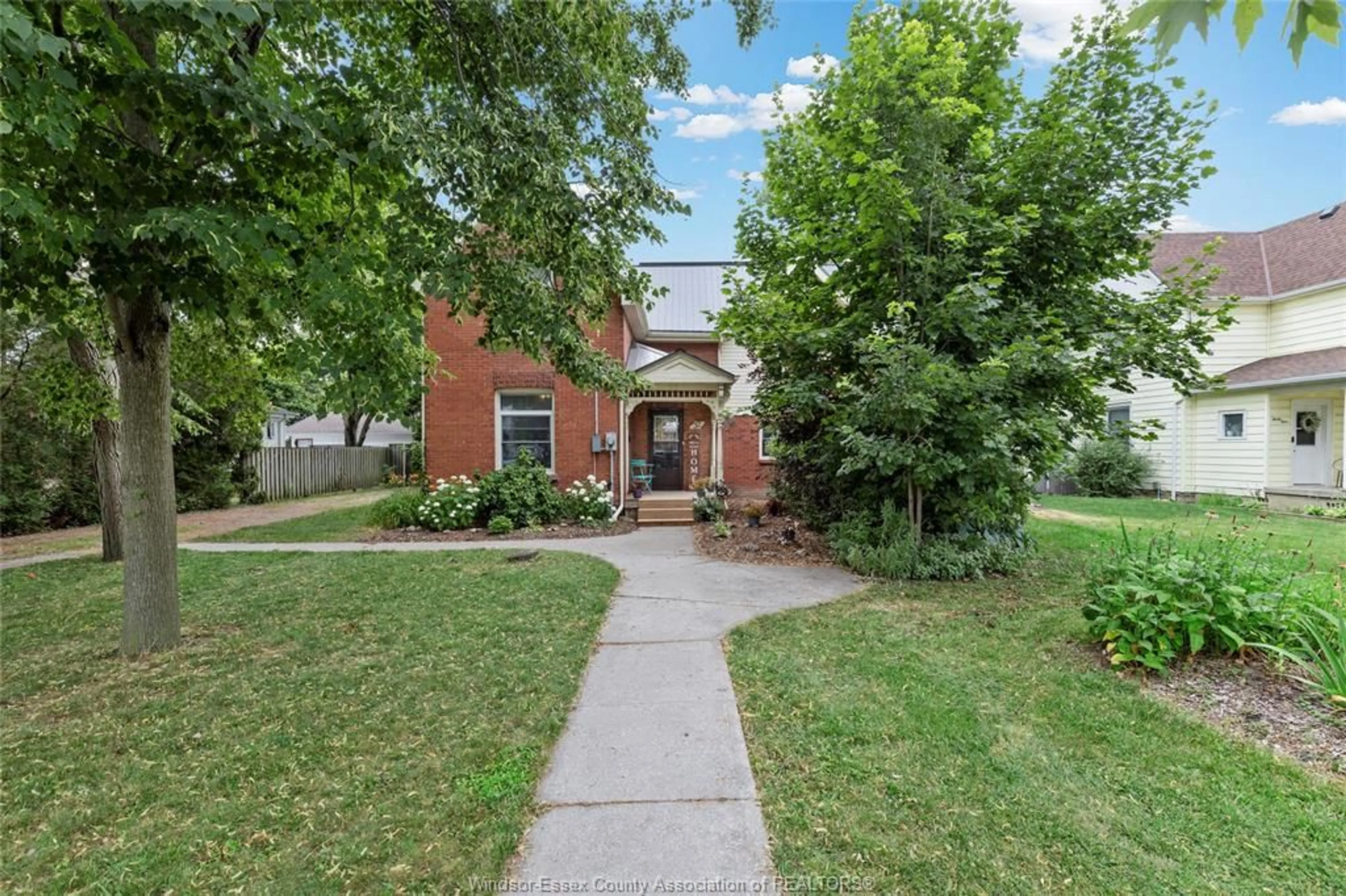 Home with brick exterior material, street for 32 CANAL St, Tilbury Ontario N0P 2L0