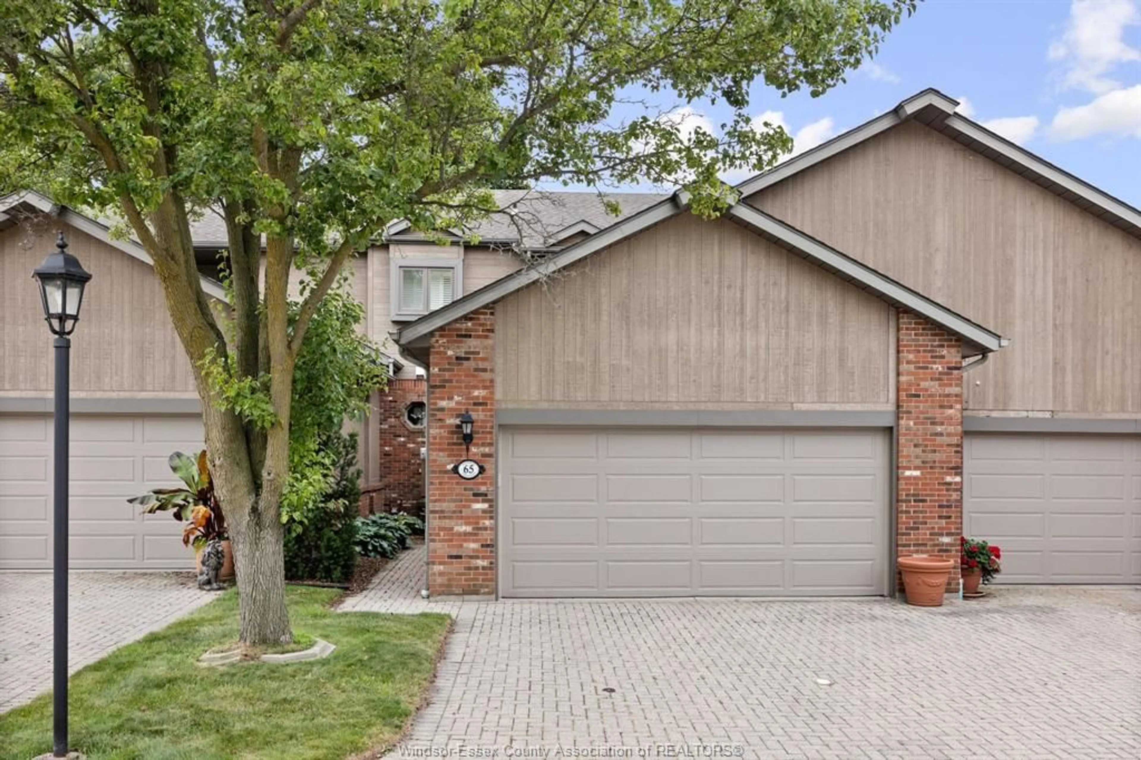 Home with brick exterior material, street for 65 FAIRWAY #4, Amherstburg Ontario N9V 3T7