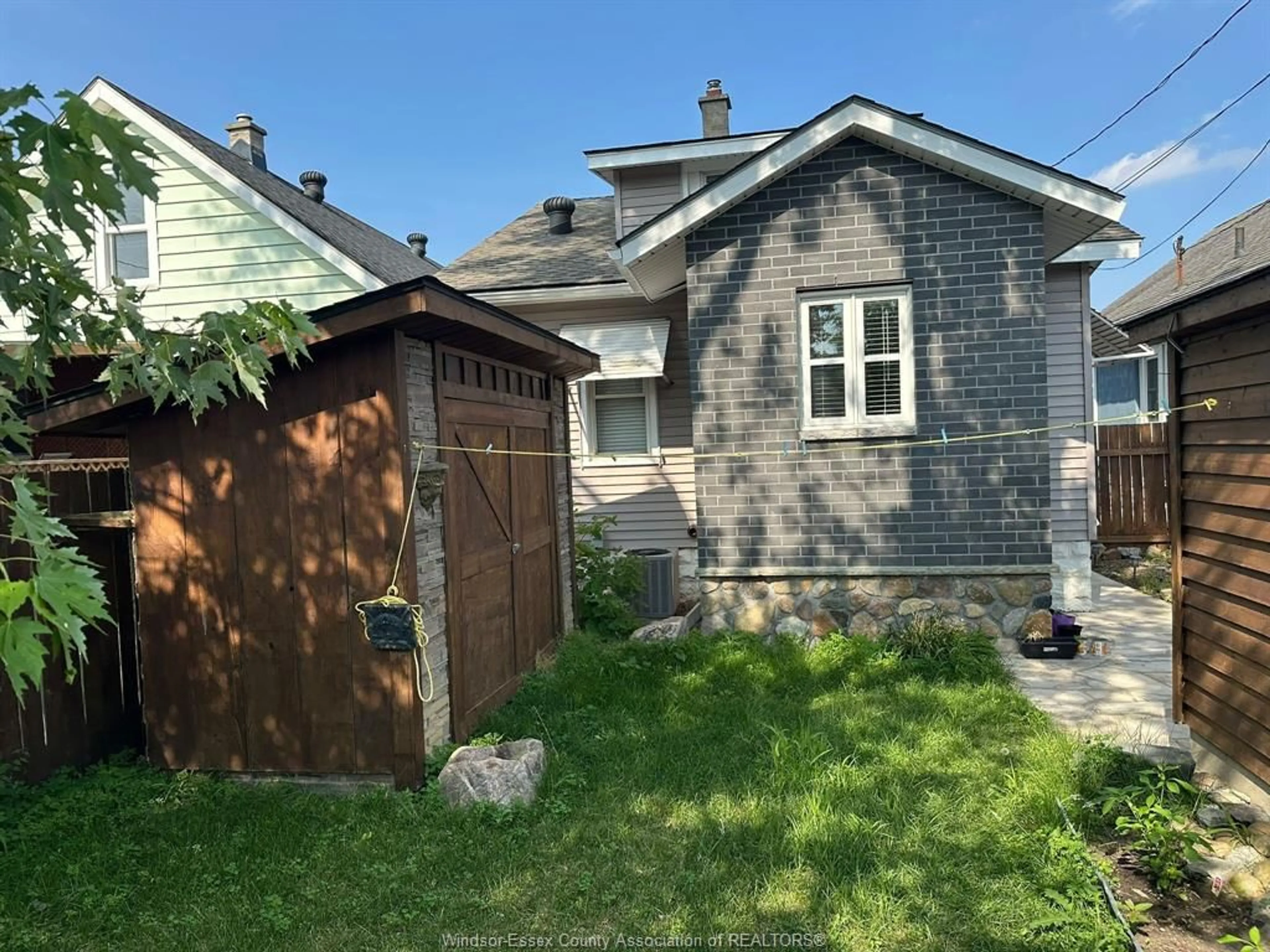 A pic from outside/outdoor area/front of a property/back of a property/a pic from drone, street for 1479 LILLIAN Ave, Windsor Ontario N8X 4A7