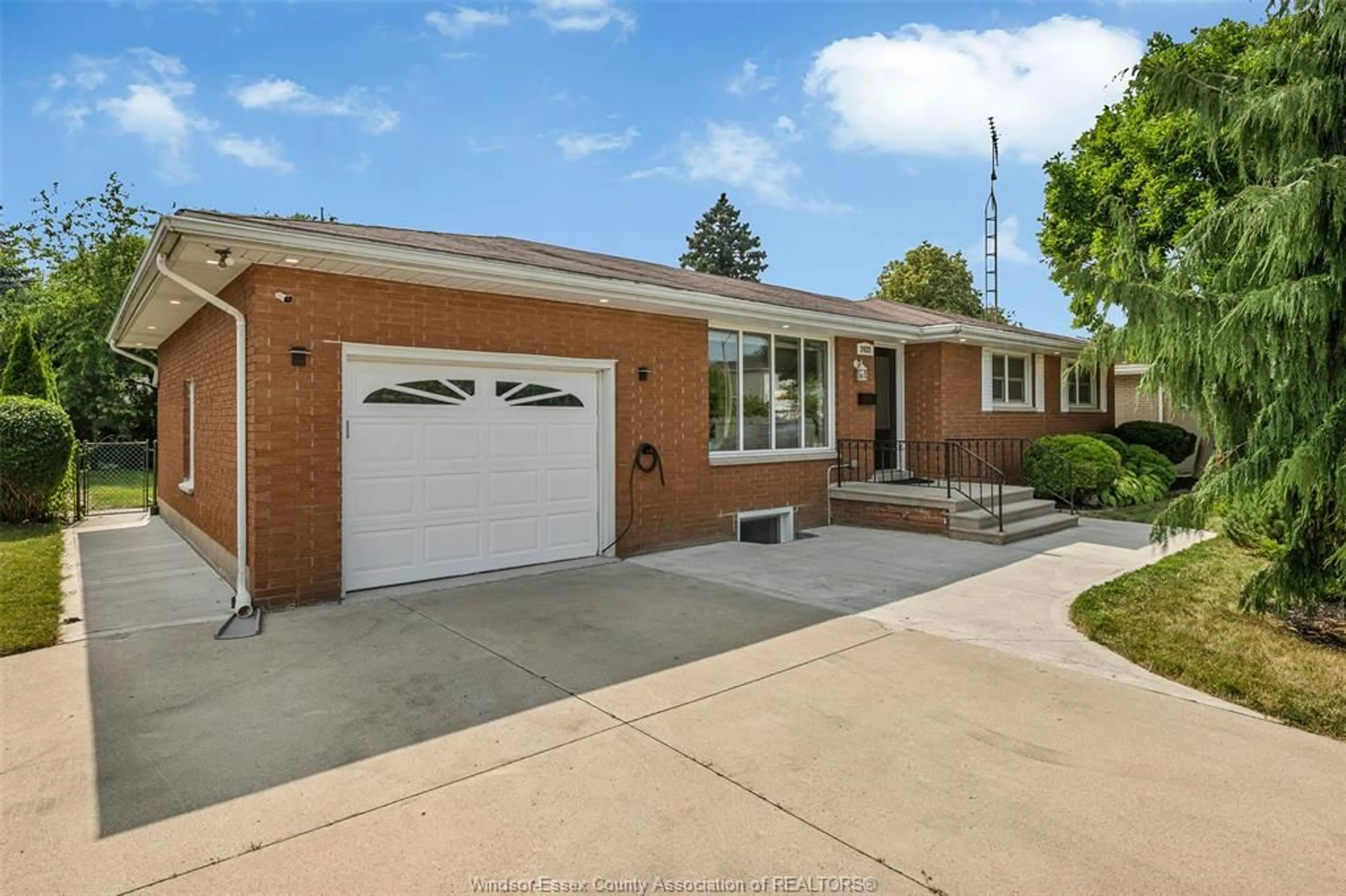 Home with brick exterior material, street for 2435 McKay Ave, Windsor Ontario N9E 2P4