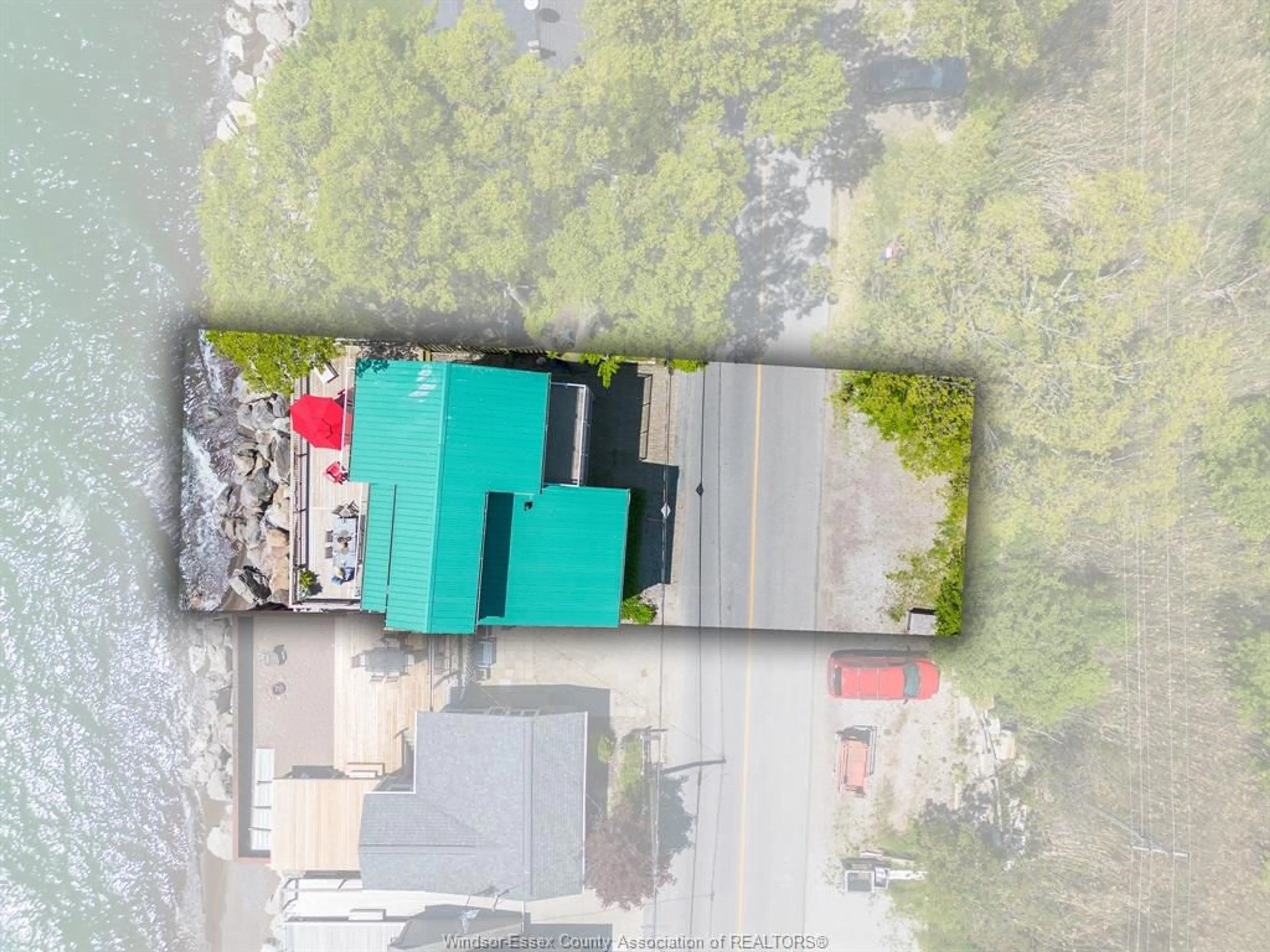 A pic from outside/outdoor area/front of a property/back of a property/a pic from drone, street for 992 Pt. Pelee Dr, Leamington Ontario N8H 3V4