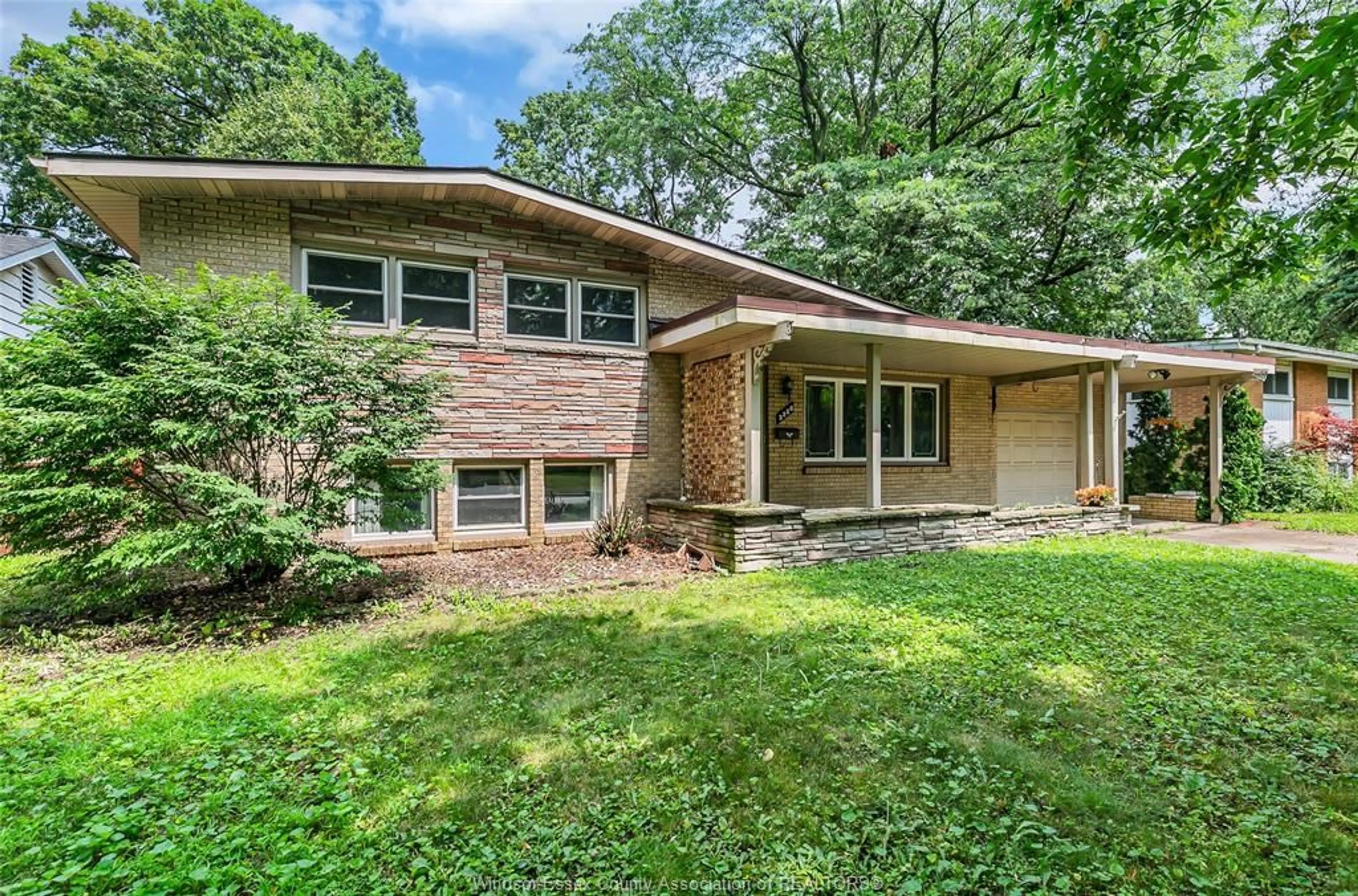 Home with brick exterior material, unknown for 3350 GLENWOOD, Windsor Ontario N9E 2Y2