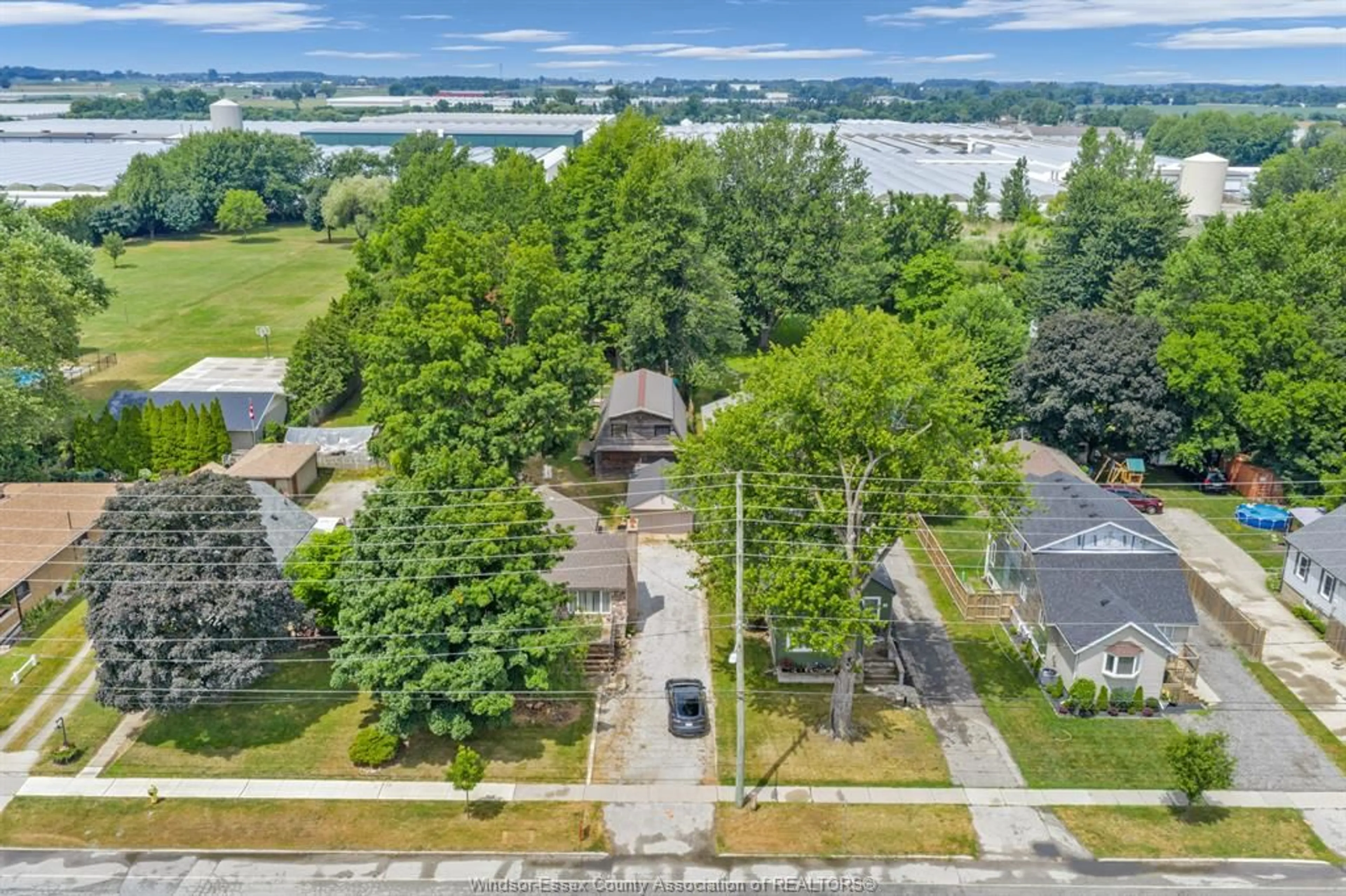 A pic from outside/outdoor area/front of a property/back of a property/a pic from drone, water/lake/river/ocean view for 35 WILKINSON Dr, Leamington Ontario N8H 1A1