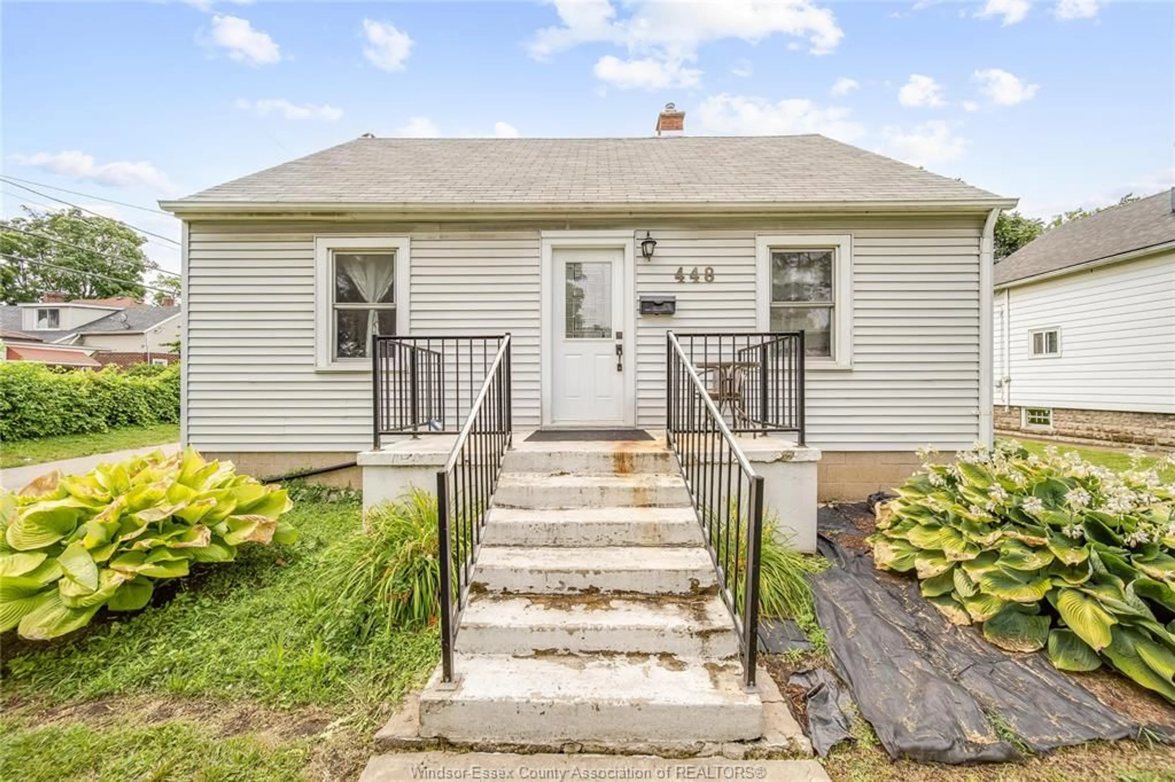 Home with vinyl exterior material, street for 448 ELLIS, Windsor Ontario N8X 1B2