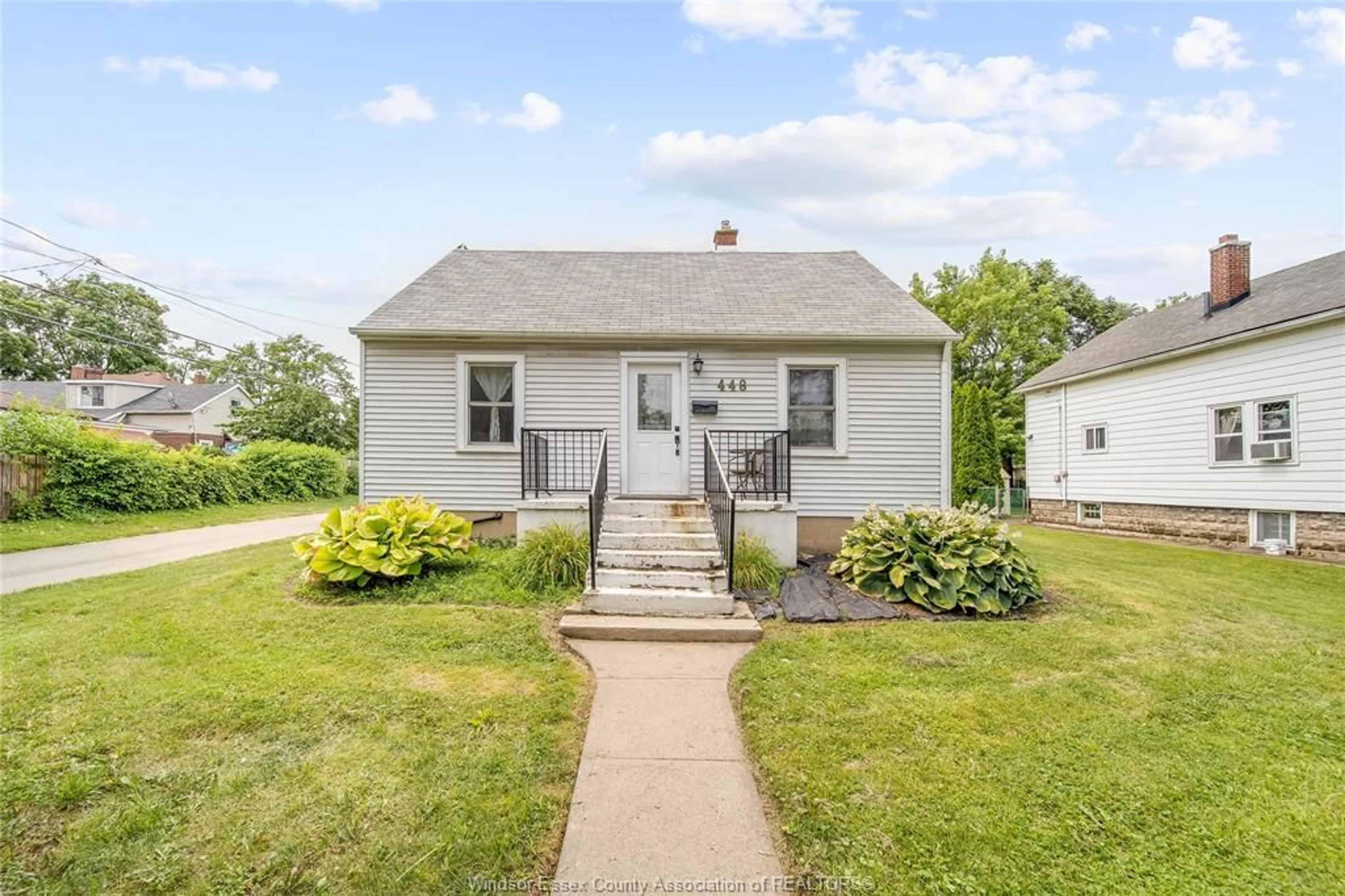 Home with vinyl exterior material, street for 448 ELLIS, Windsor Ontario N8X 1B2