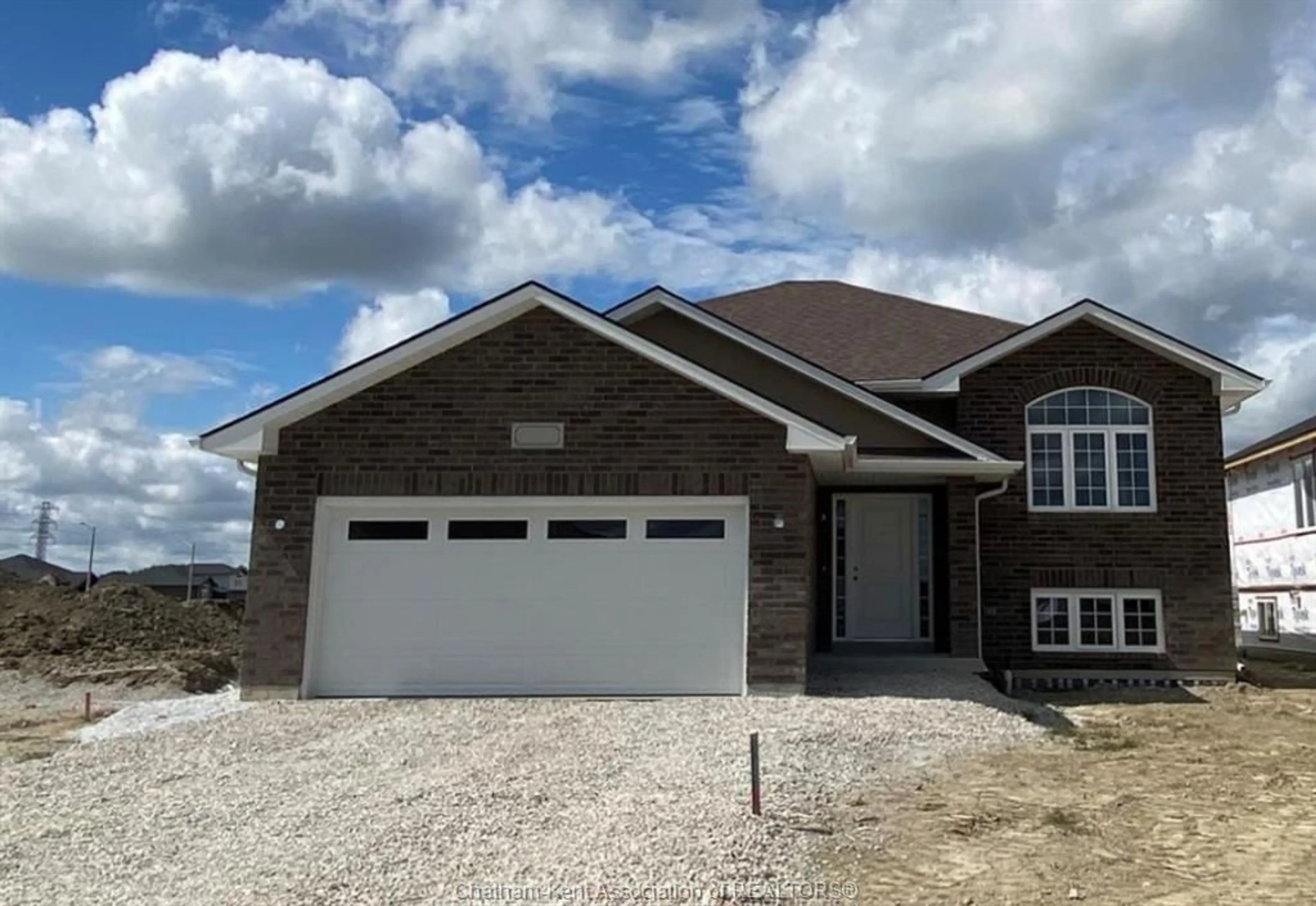 Home with brick exterior material, street for 384 Hemlock Lane, Belle River Ontario N0R 1A0