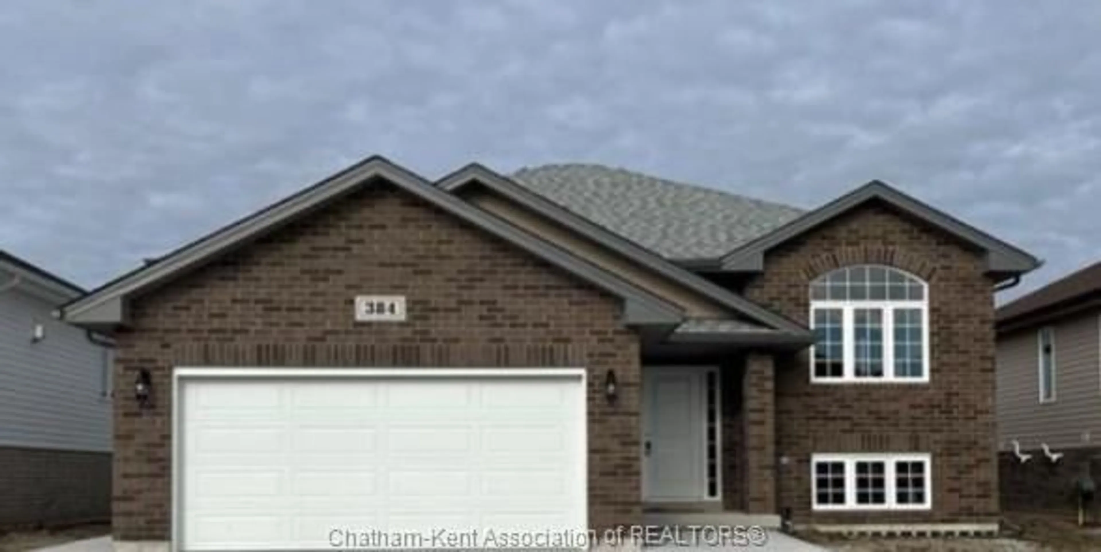 Home with brick exterior material, street for 384 Hemlock Lane, Belle River Ontario N0R 1A0