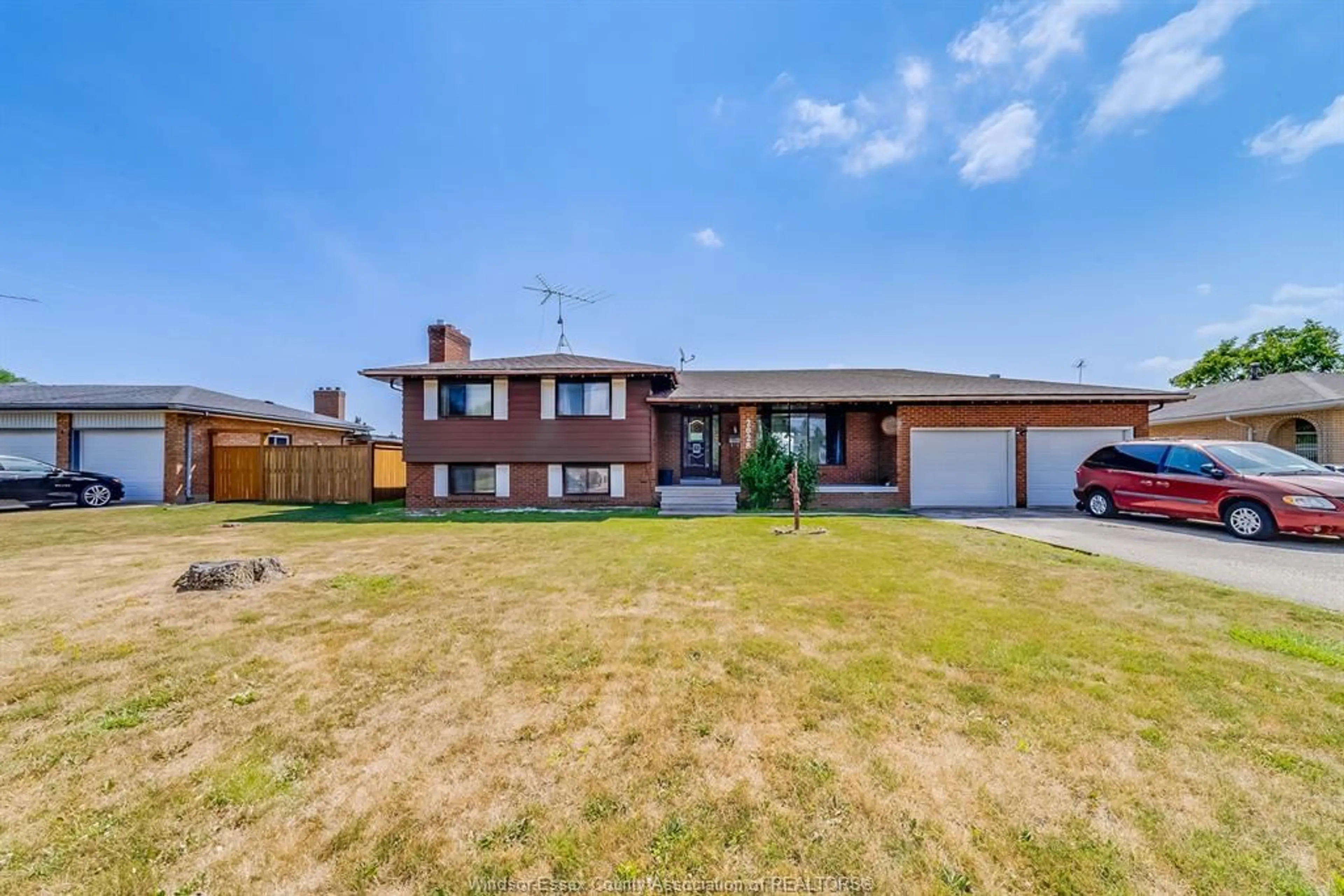 A pic from outside/outdoor area/front of a property/back of a property/a pic from drone, street for 2028 LESPERANCE, Tecumseh Ontario N8N 2N4