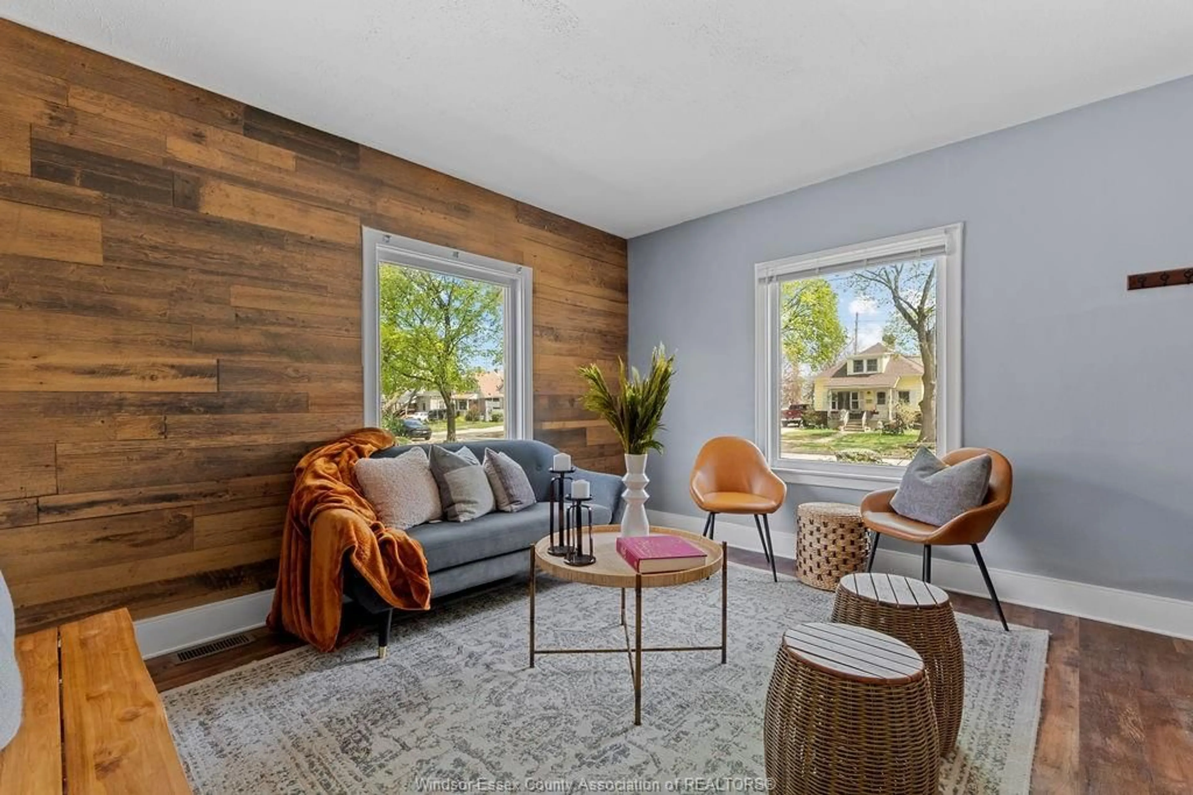 Living room with furniture, wood/laminate floor for 2263 TURNER Rd, Windsor Ontario N8W 3K4