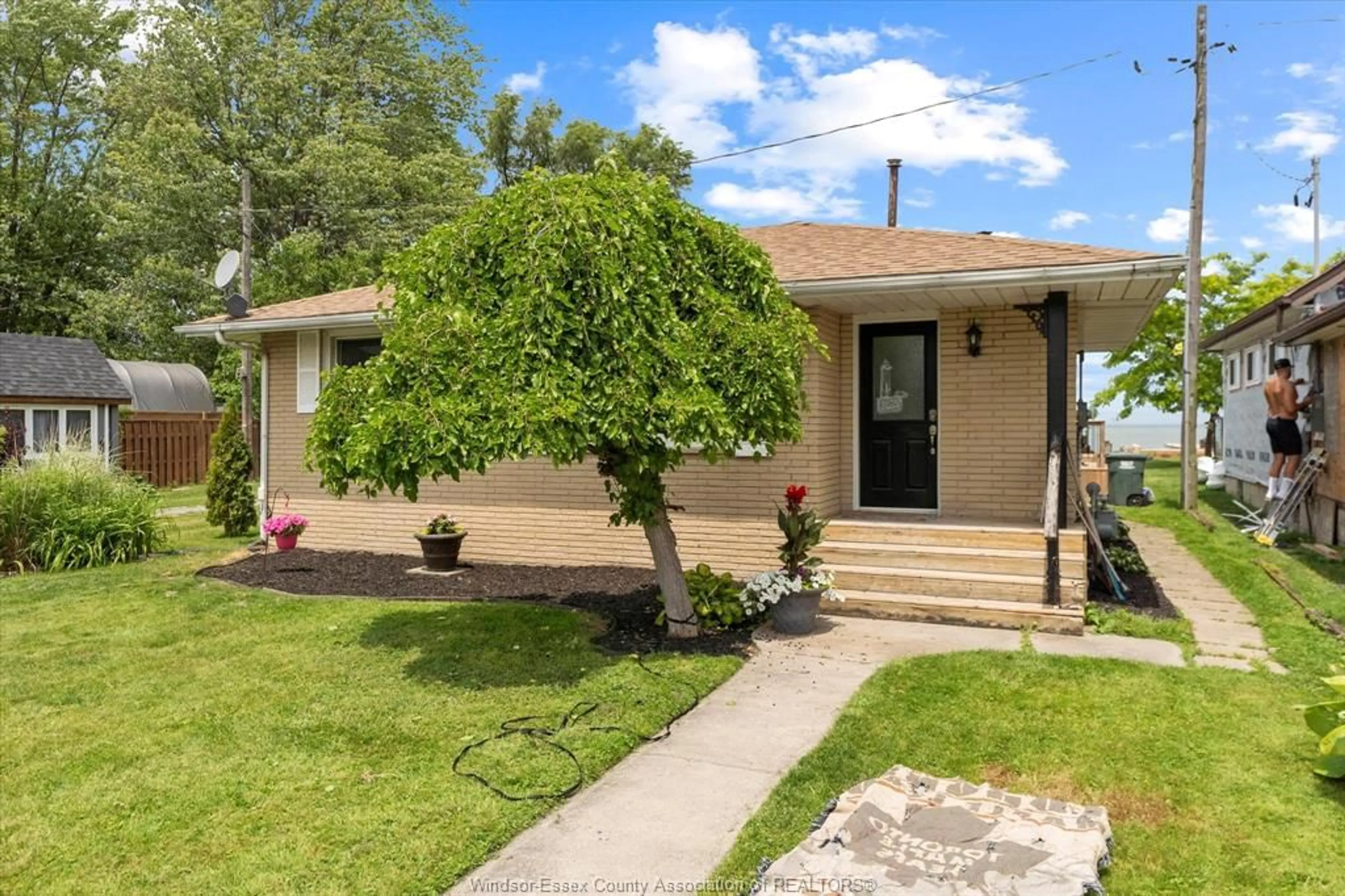 Home with vinyl exterior material, street for 591 ROSS BEACH Rd, Lakeshore Ontario N0R 1A0
