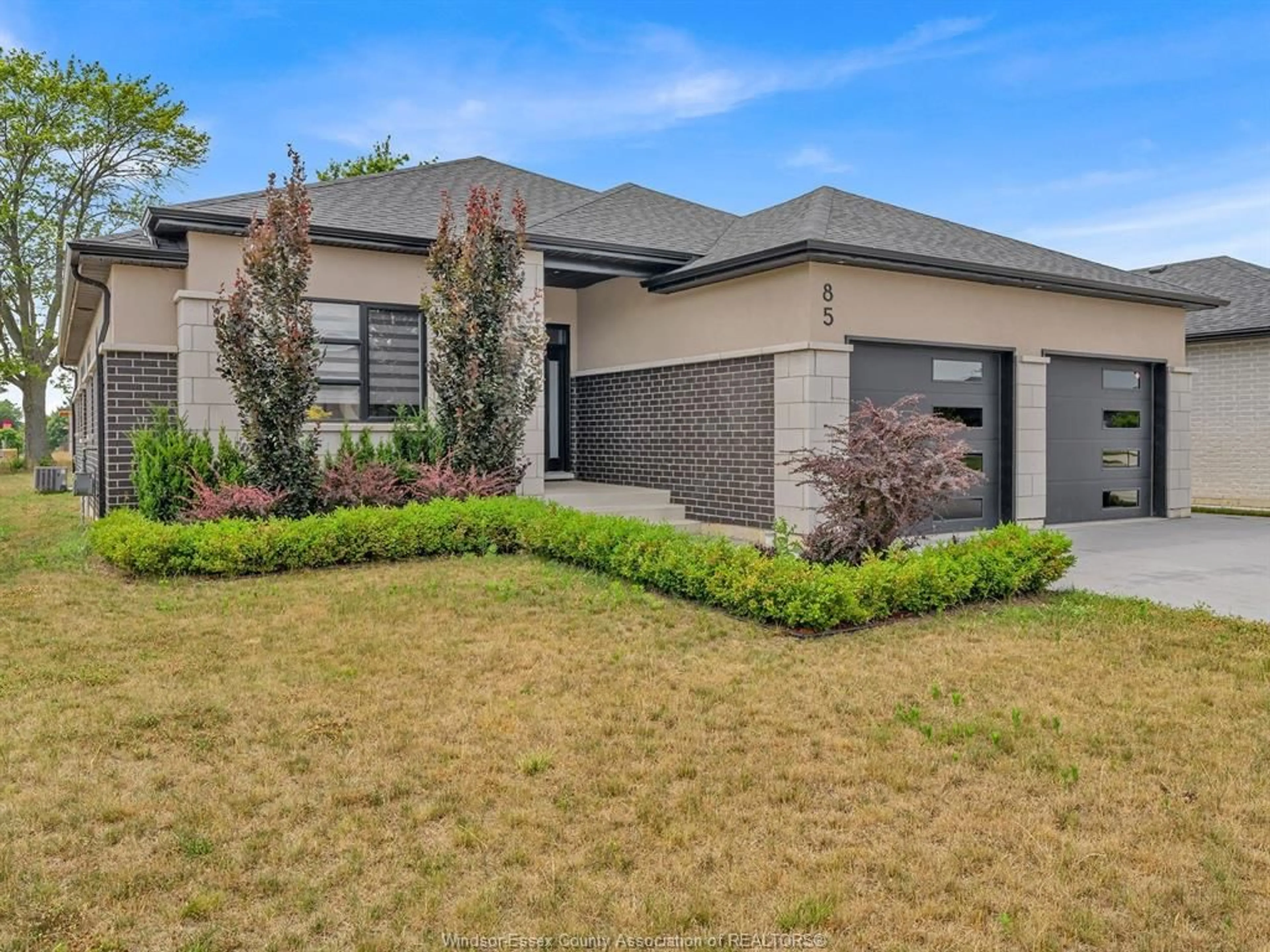 Home with brick exterior material, street for 85 OLIVE Dr, Leamington Ontario N8H 0E7