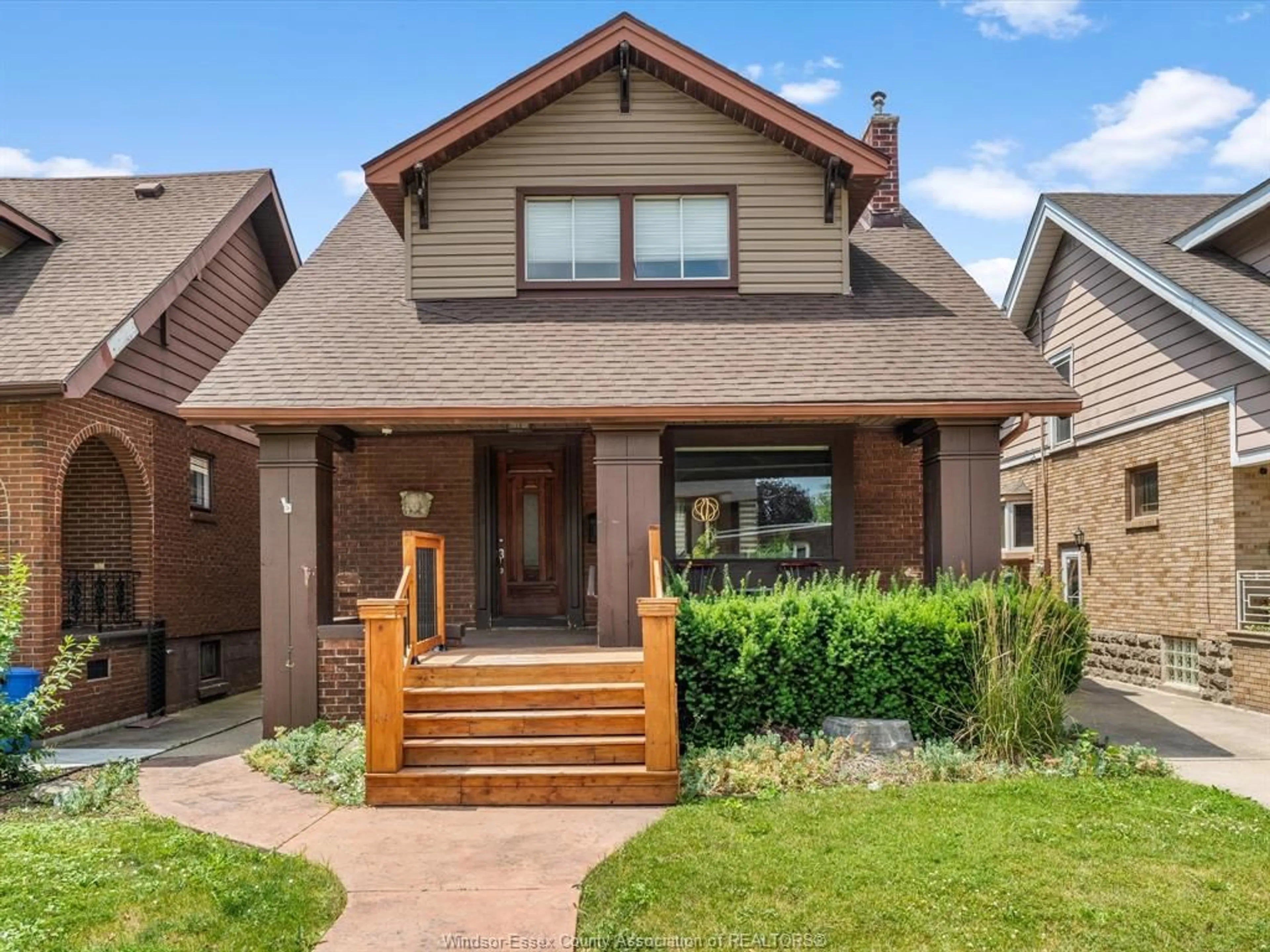 Home with brick exterior material, street for 1671 Victoria Ave, Windsor Ontario N8X 1P6