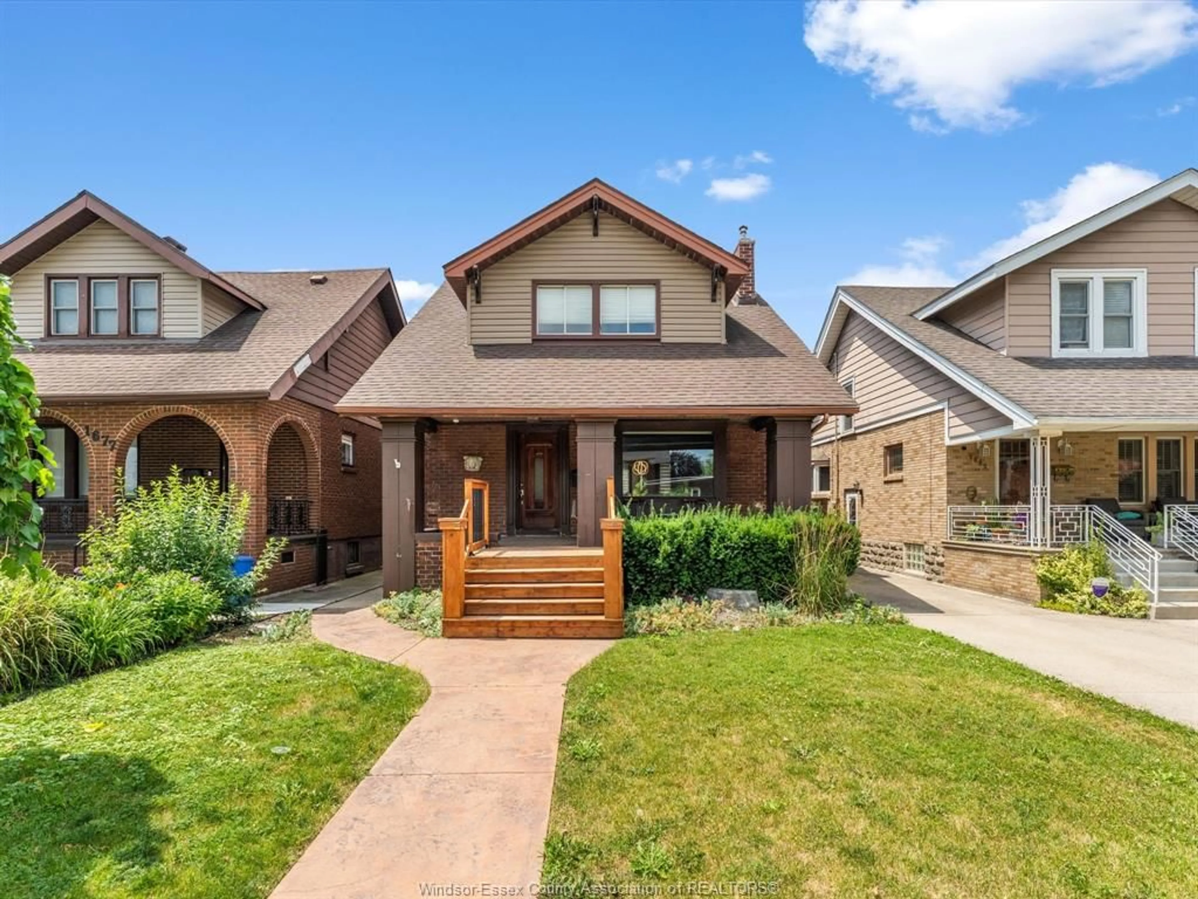 Home with brick exterior material, street for 1671 Victoria Ave, Windsor Ontario N8X 1P6