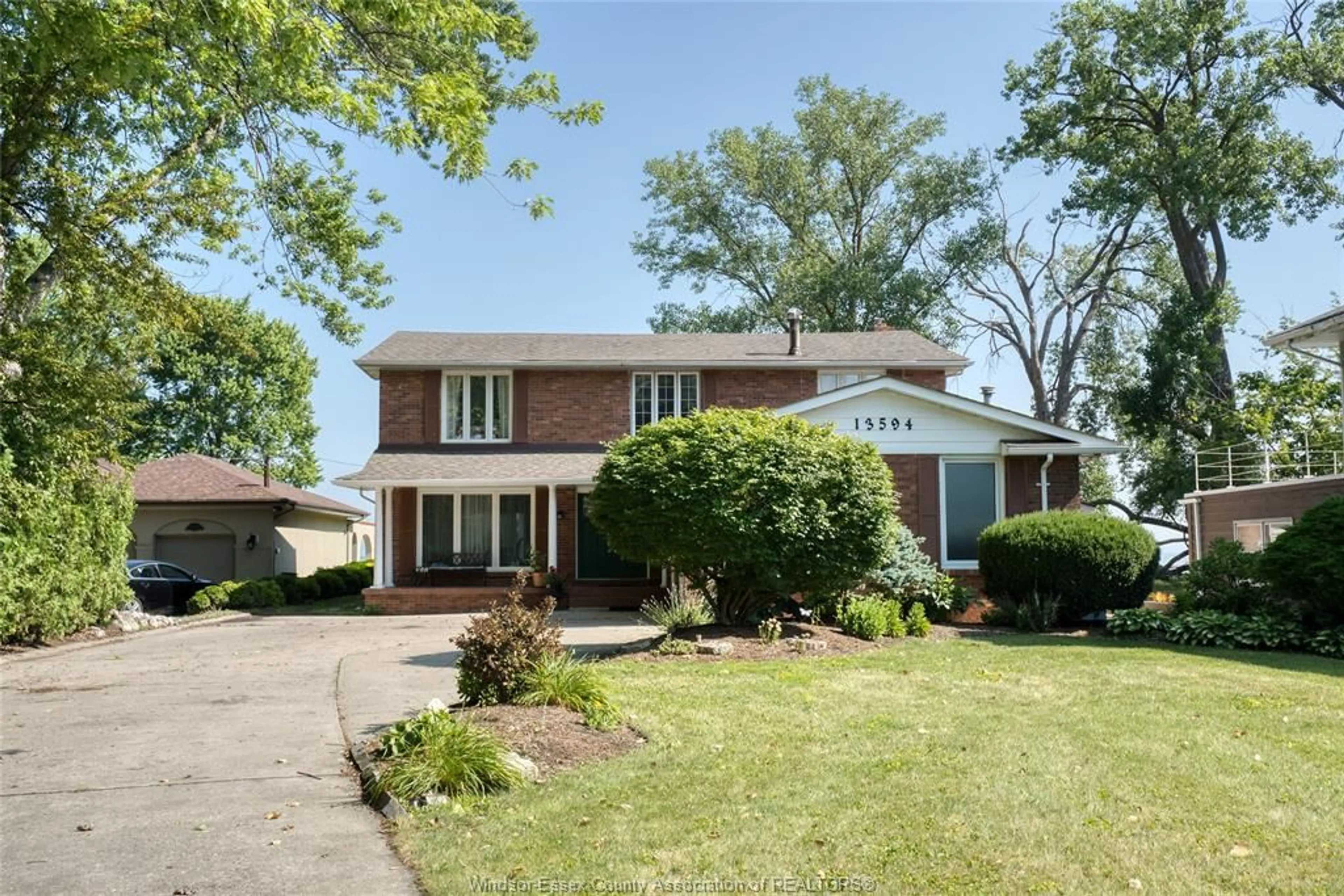 Home with brick exterior material, street for 13594 RIVERSIDE Dr, Tecumseh Ontario N8N 2M8