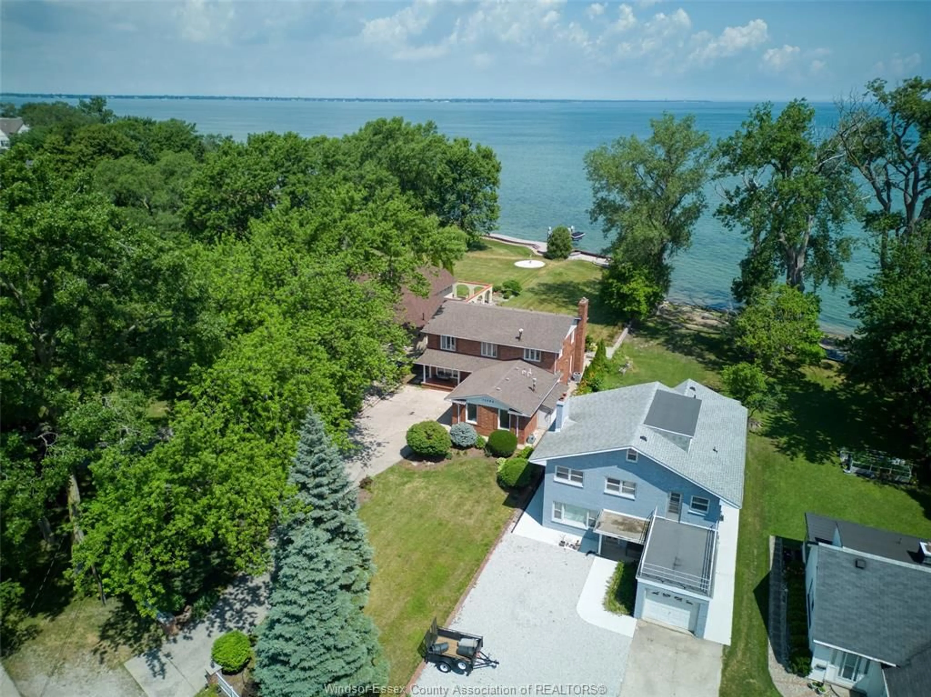 A pic from outside/outdoor area/front of a property/back of a property/a pic from drone, water/lake/river/ocean view for 13594 RIVERSIDE Dr, Tecumseh Ontario N8N 2M8