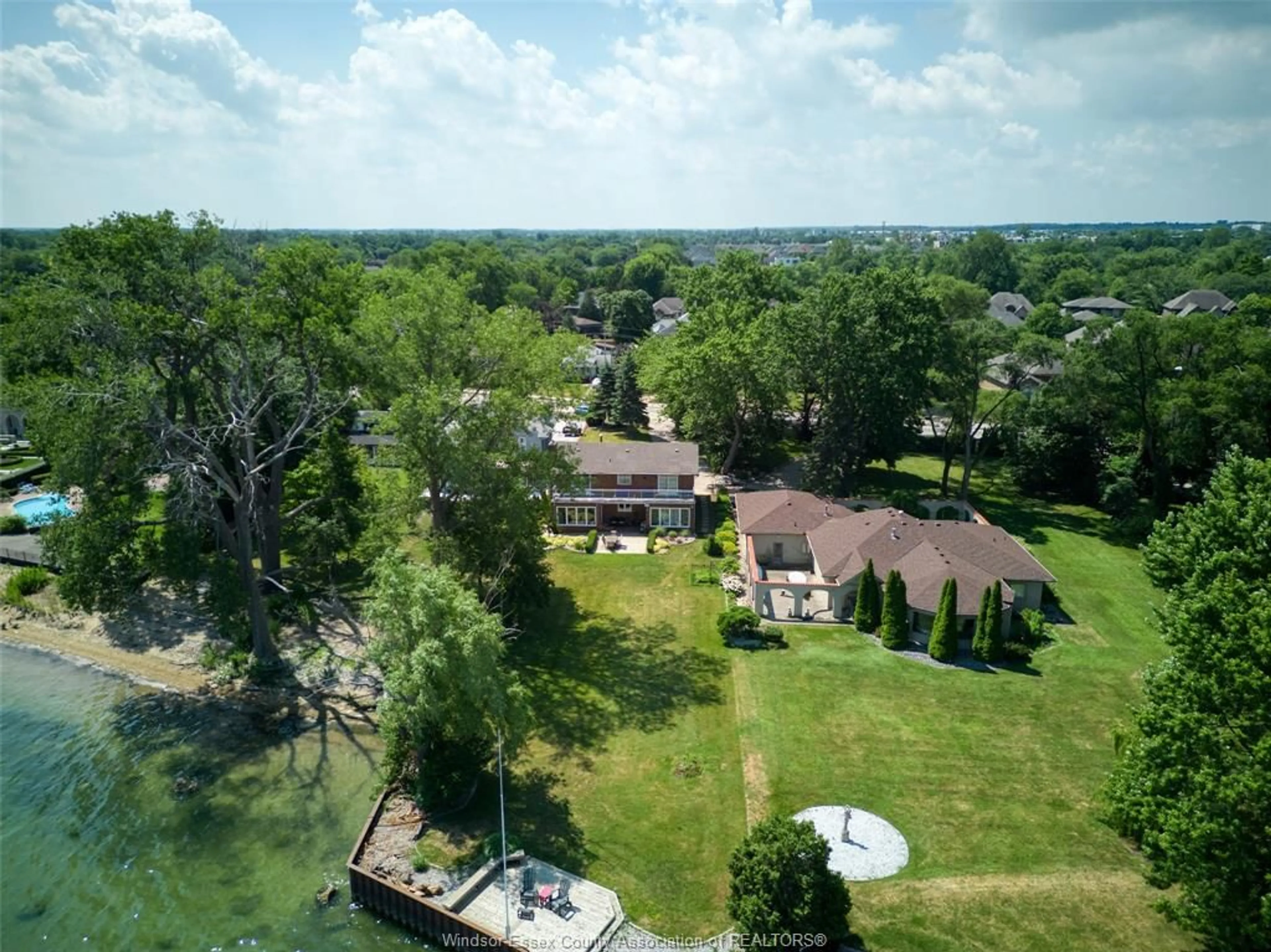 A pic from outside/outdoor area/front of a property/back of a property/a pic from drone, water/lake/river/ocean view for 13594 RIVERSIDE Dr, Tecumseh Ontario N8N 2M8