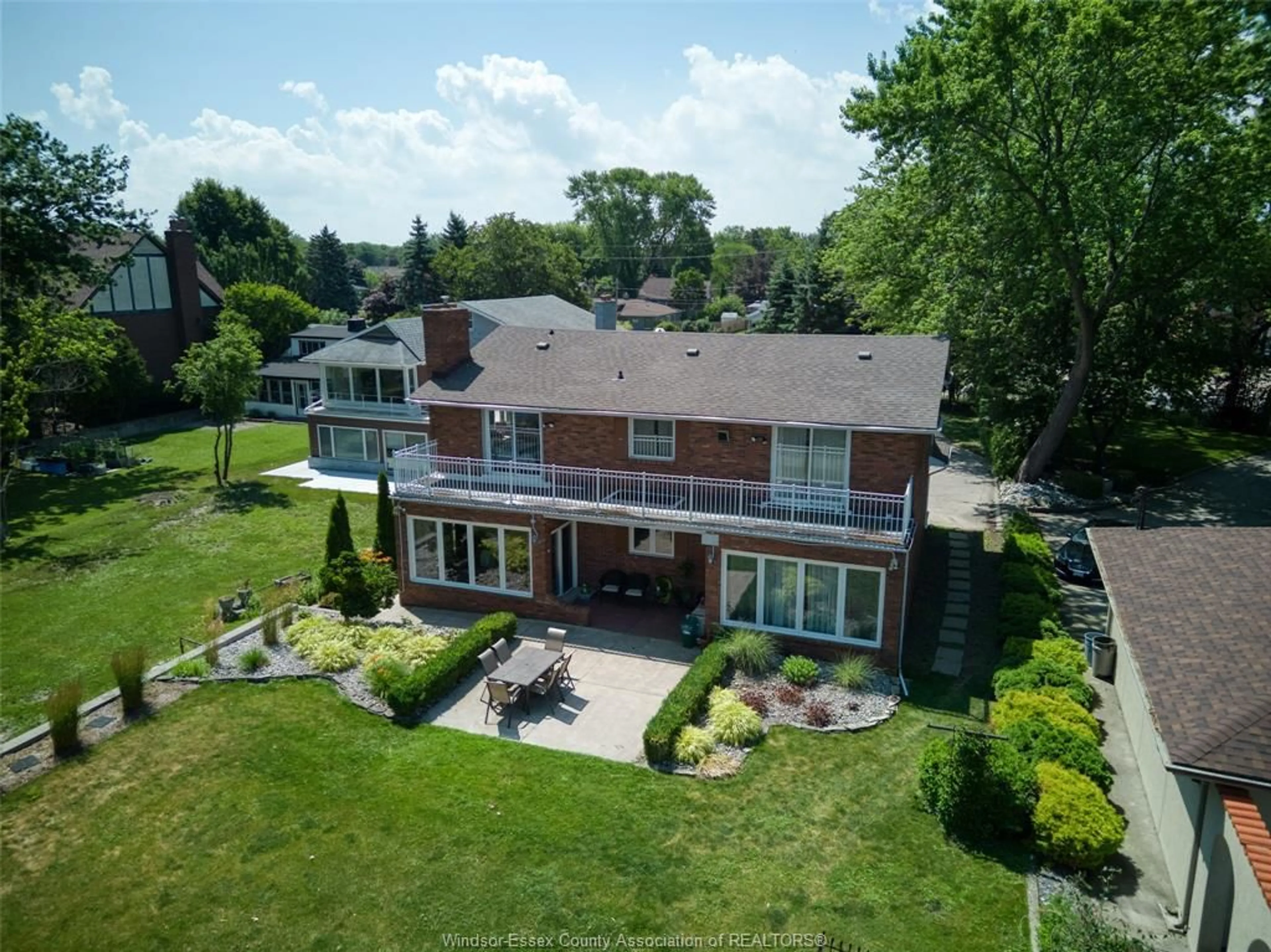 A pic from outside/outdoor area/front of a property/back of a property/a pic from drone, unknown for 13594 RIVERSIDE Dr, Tecumseh Ontario N8N 2M8