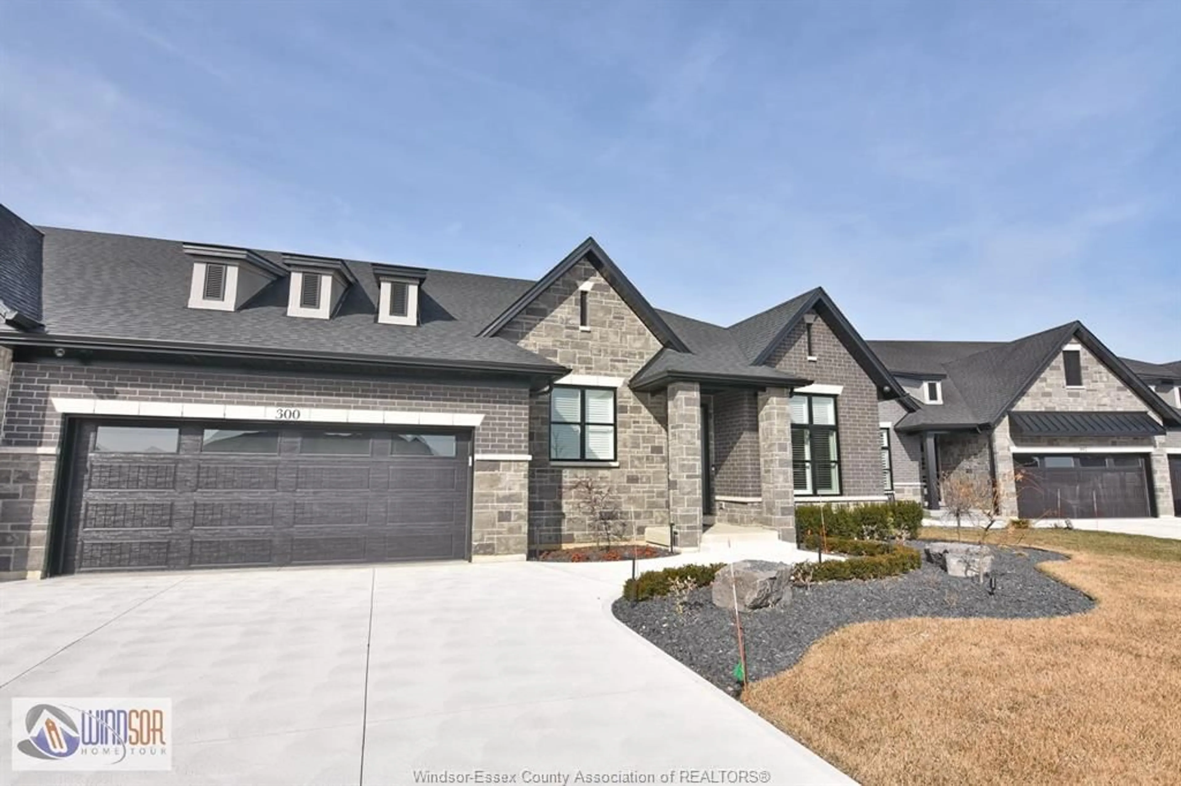Home with brick exterior material, street for 300 XAVIER Cir, Lakeshore Ontario N8N 3T2
