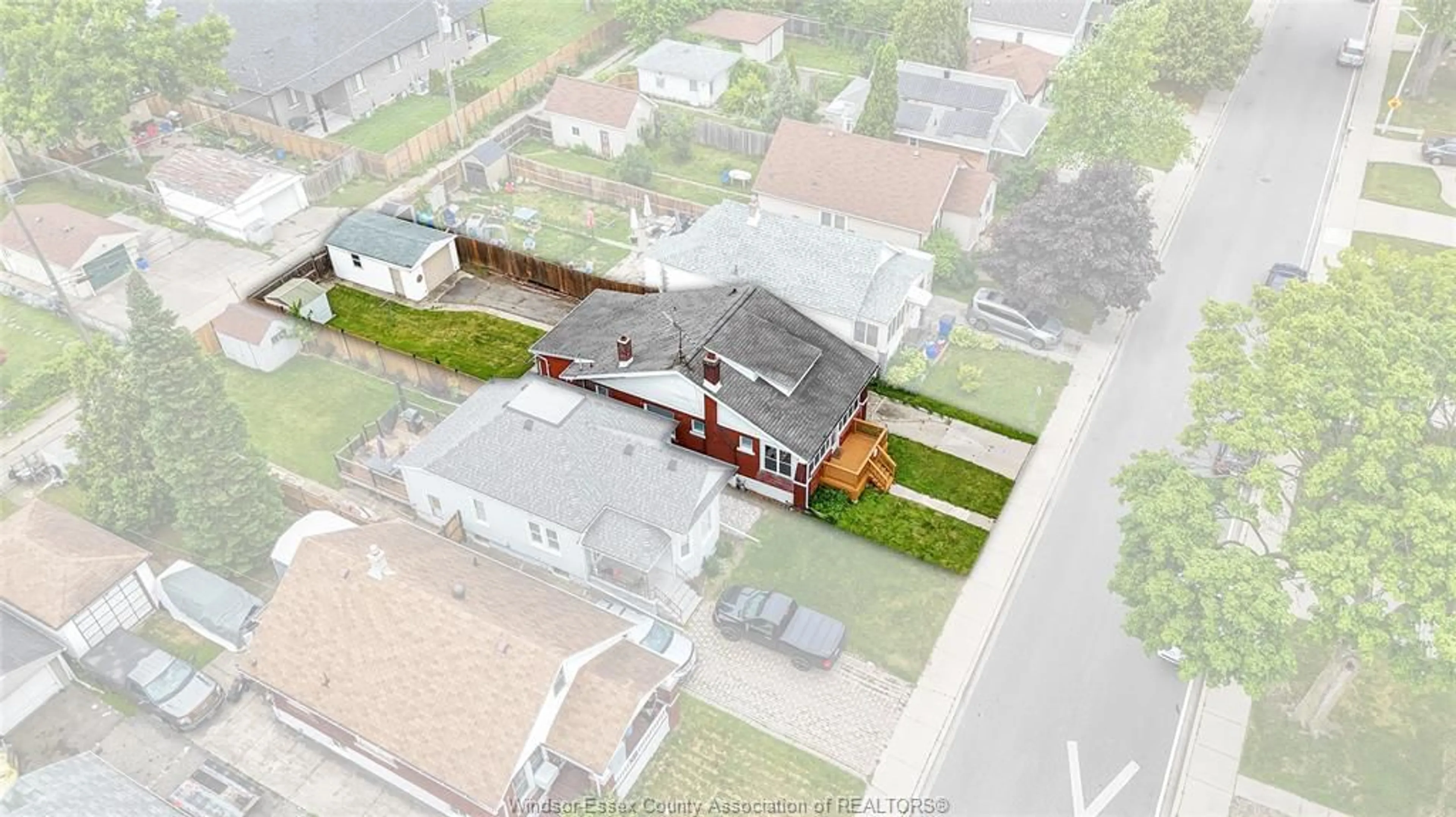 A pic from outside/outdoor area/front of a property/back of a property/a pic from drone, street for 1791 HALL, Windsor Ontario N8W 2L5