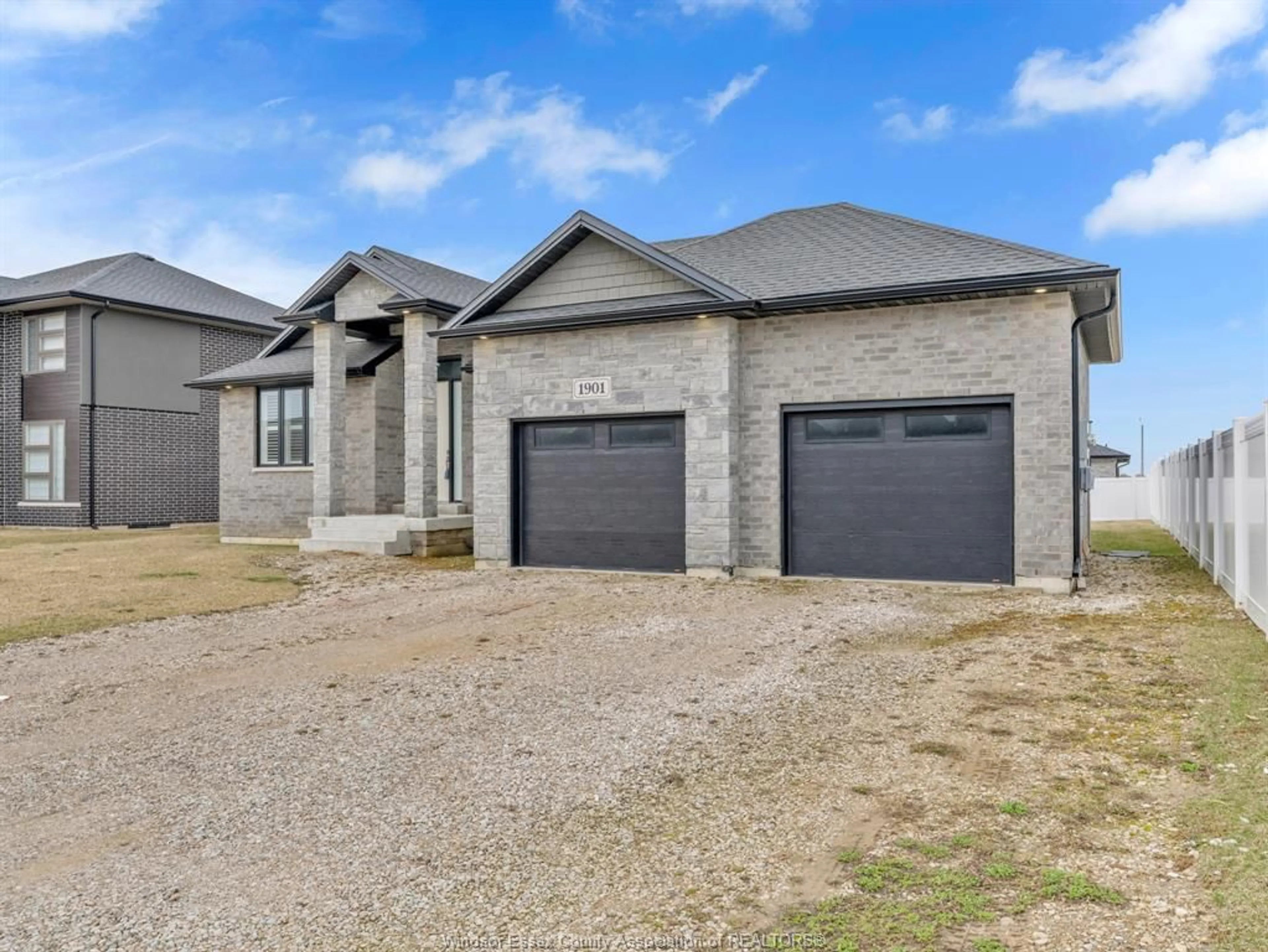 Home with brick exterior material, street for 1901 VILLA CANAL Dr, Kingsville Ontario N9Y 0G5