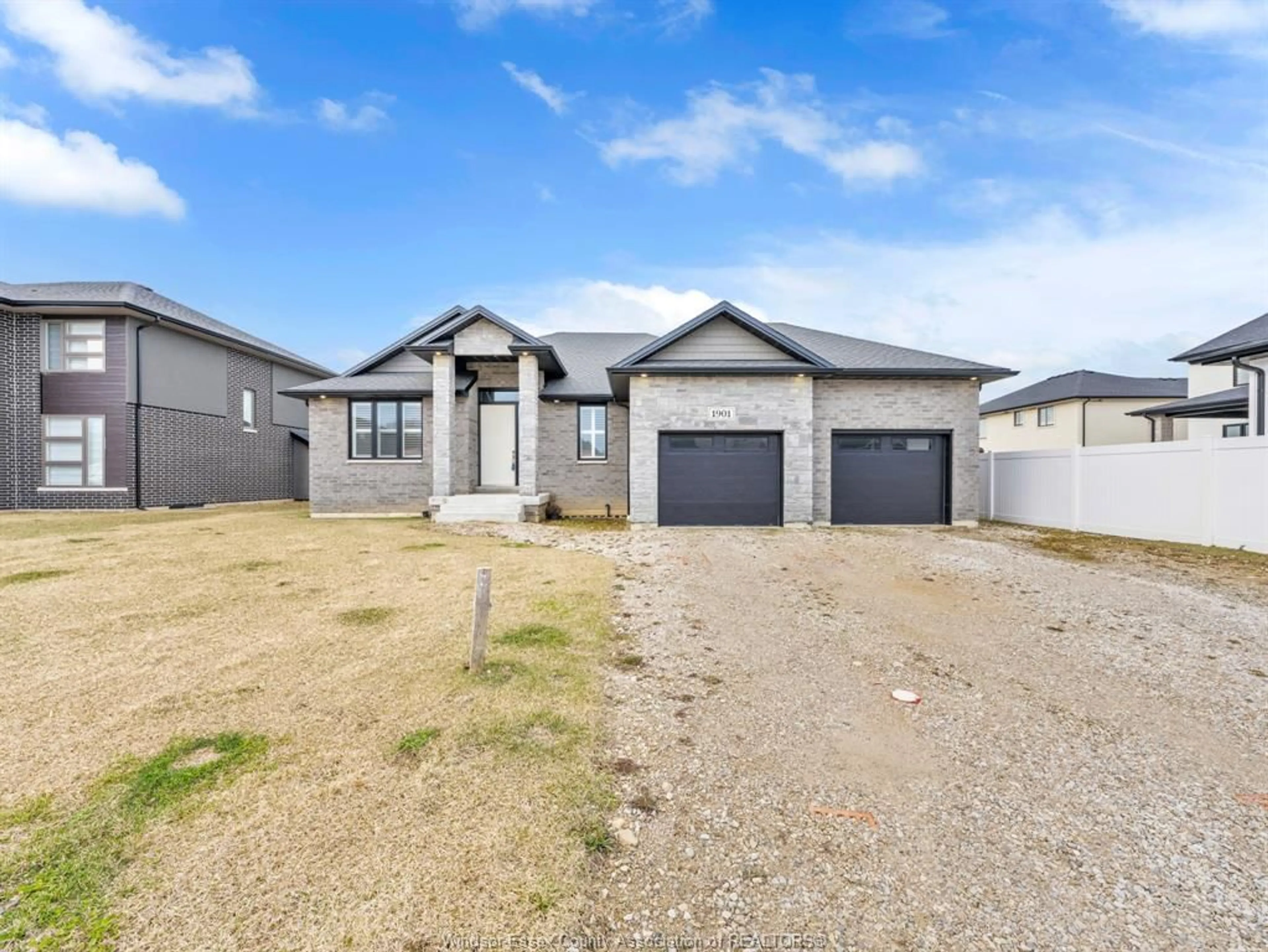 Home with vinyl exterior material, street for 1901 VILLA CANAL Dr, Kingsville Ontario N9Y 0G5