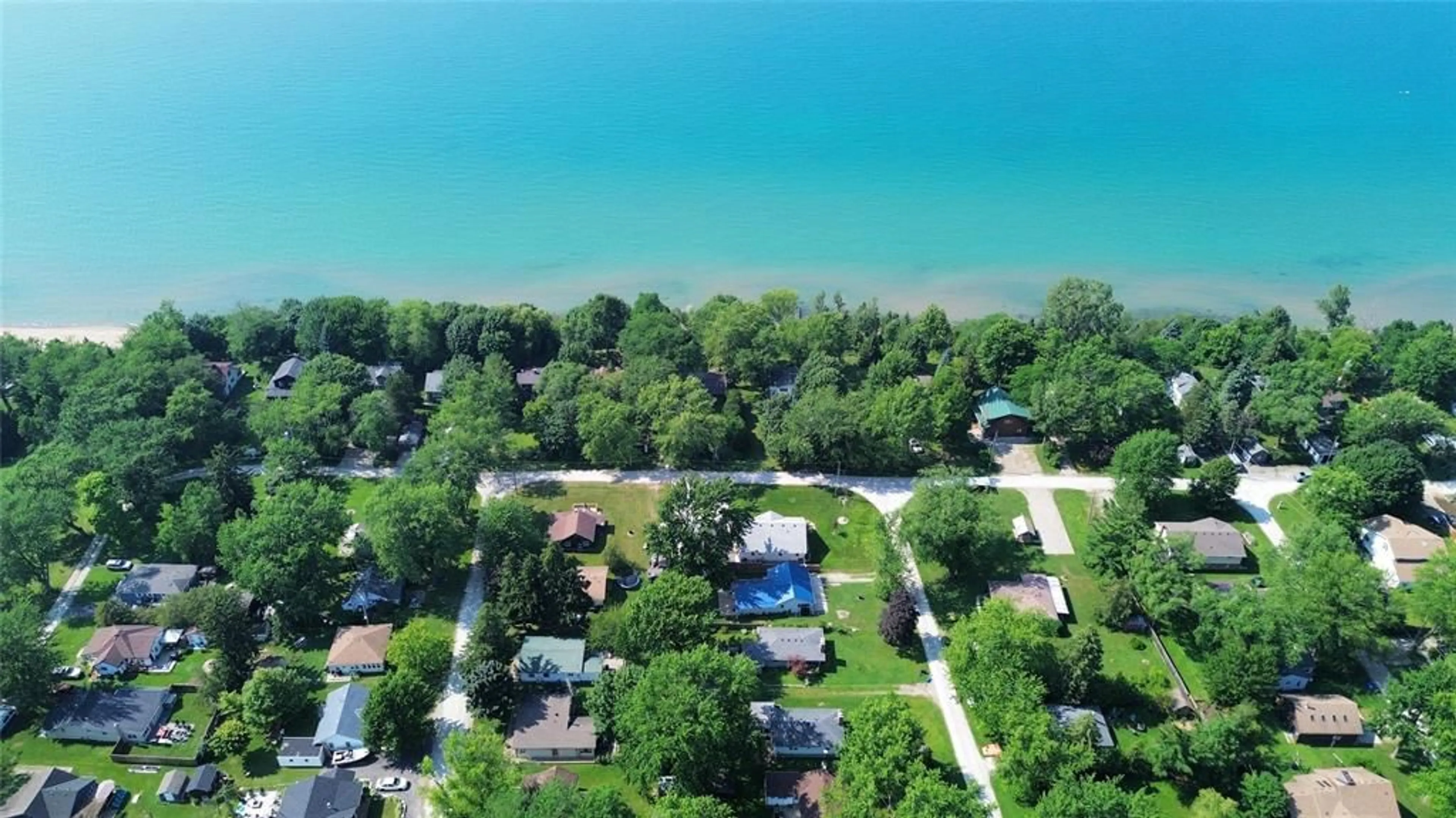 A pic from outside/outdoor area/front of a property/back of a property/a pic from drone, water/lake/river/ocean view for 7811 KEN St, Plympton-Wyoming Ontario N0N 1J6