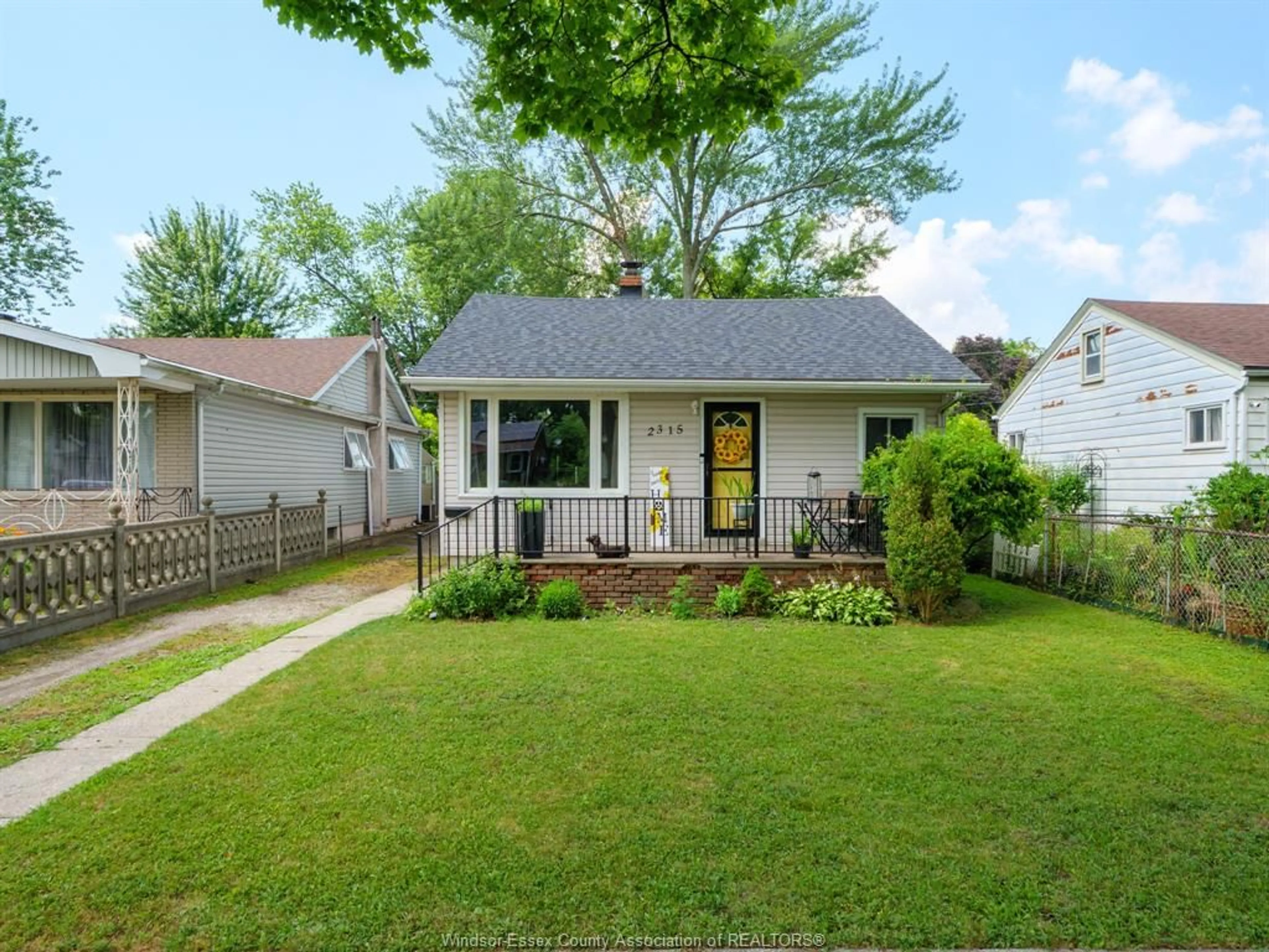 Home with vinyl exterior material, street for 2315 PARENT Ave, Windsor Ontario N8W 2E6