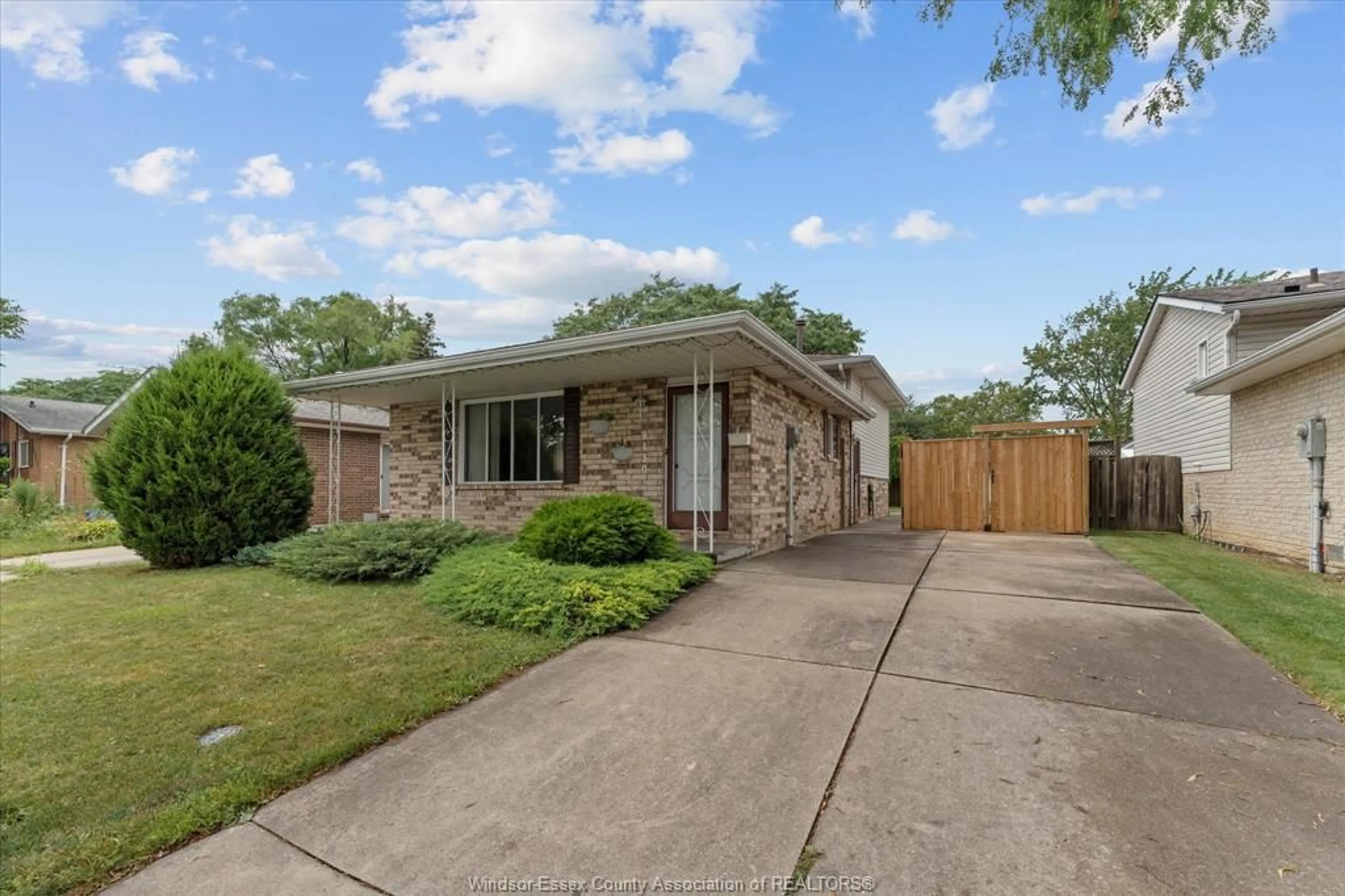 Home with brick exterior material, street for 9430 TAMARACK, Windsor Ontario N8R 1Y7
