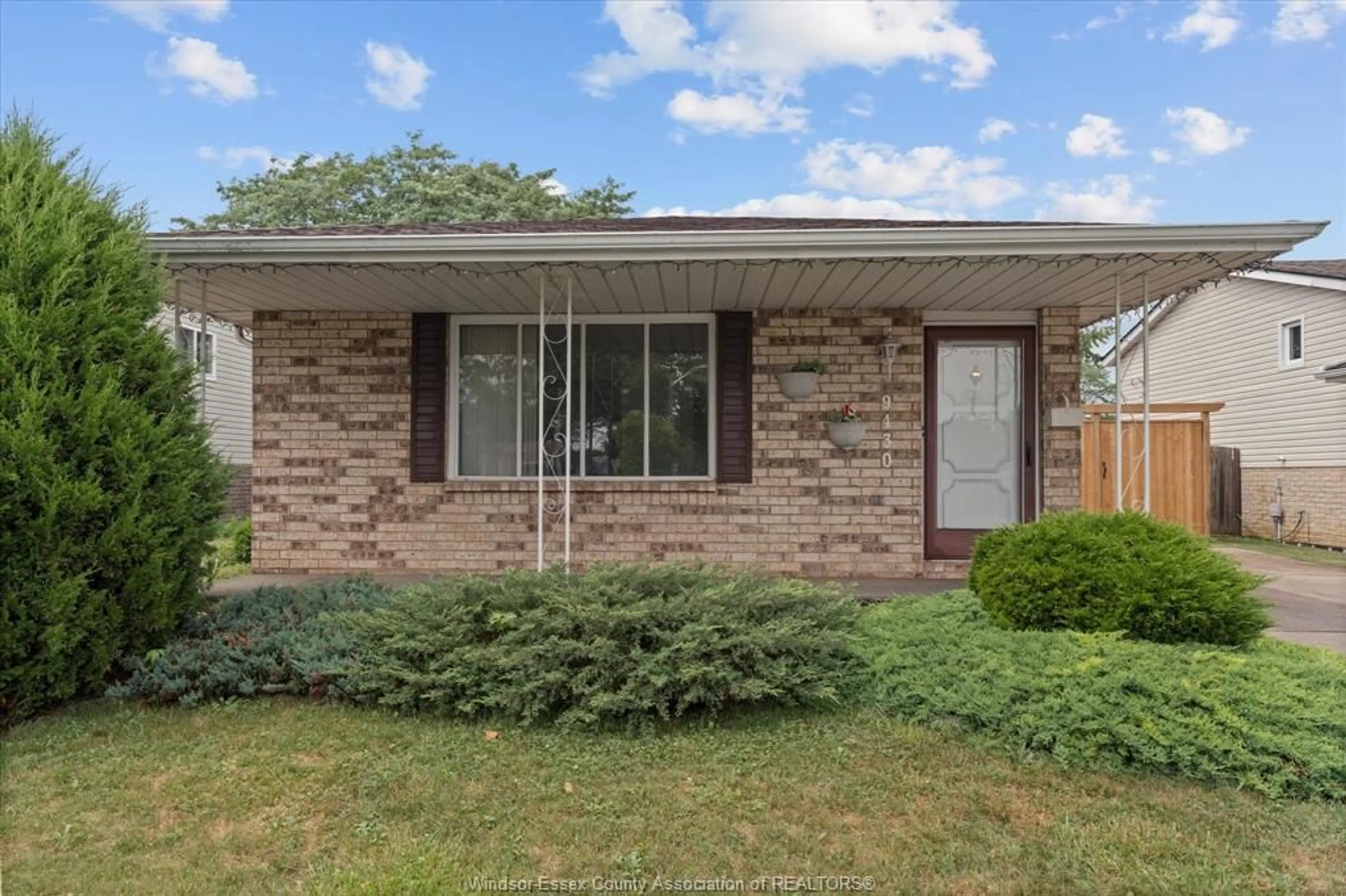 Home with brick exterior material, street for 9430 TAMARACK, Windsor Ontario N8R 1Y7