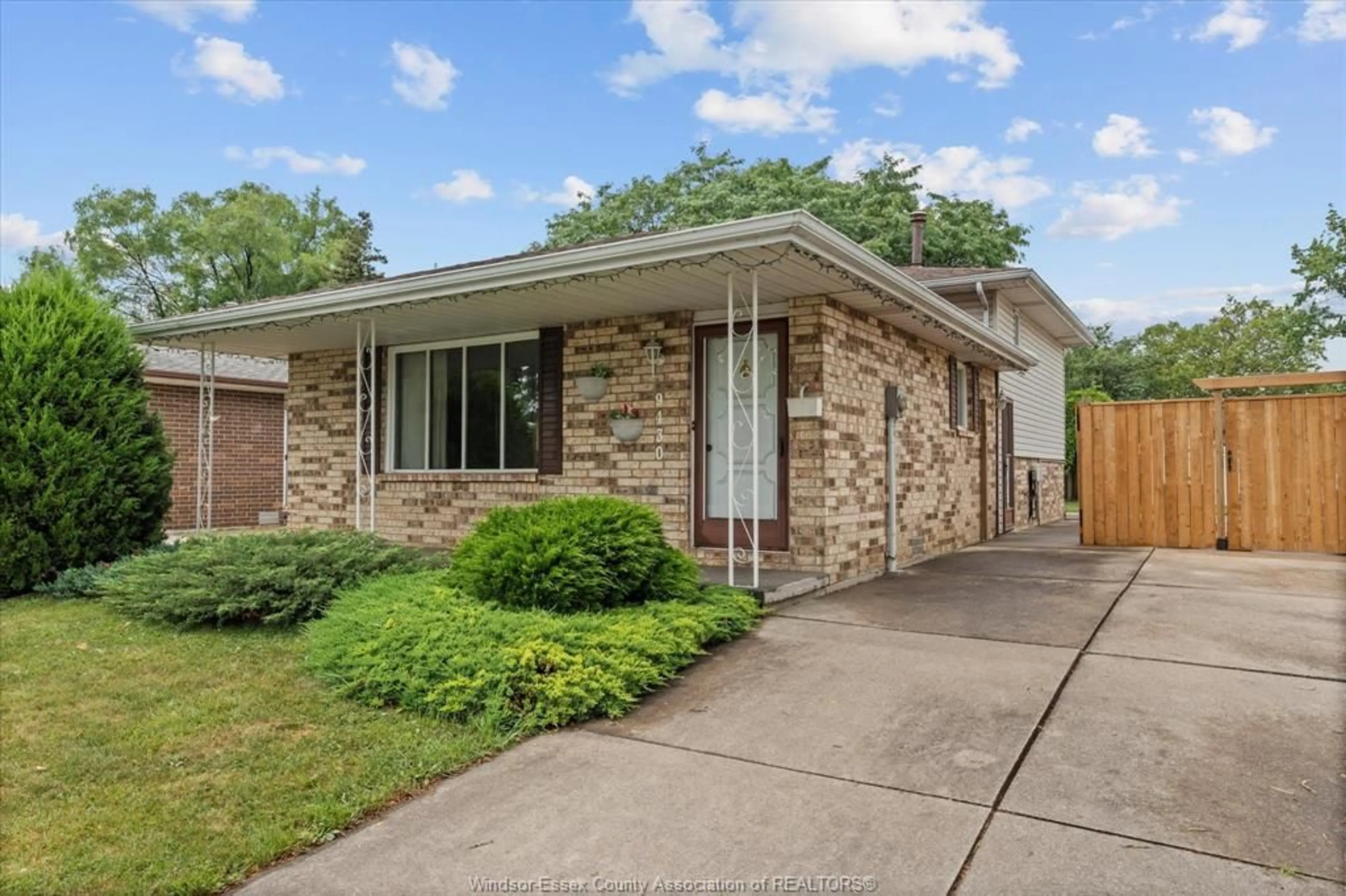 Home with brick exterior material, street for 9430 TAMARACK, Windsor Ontario N8R 1Y7