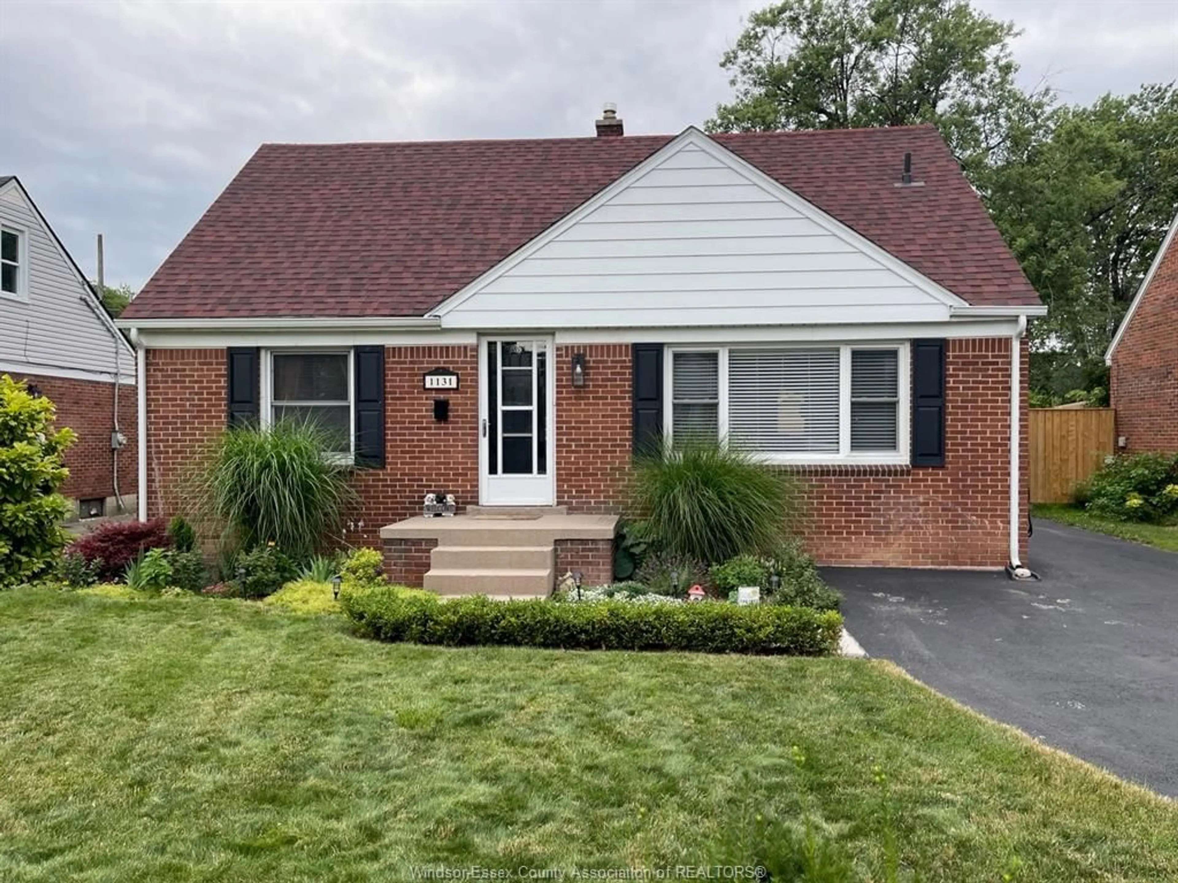 Home with brick exterior material, street for 1131 FAIRVIEW Blvd, Windsor Ontario N8S 3E3