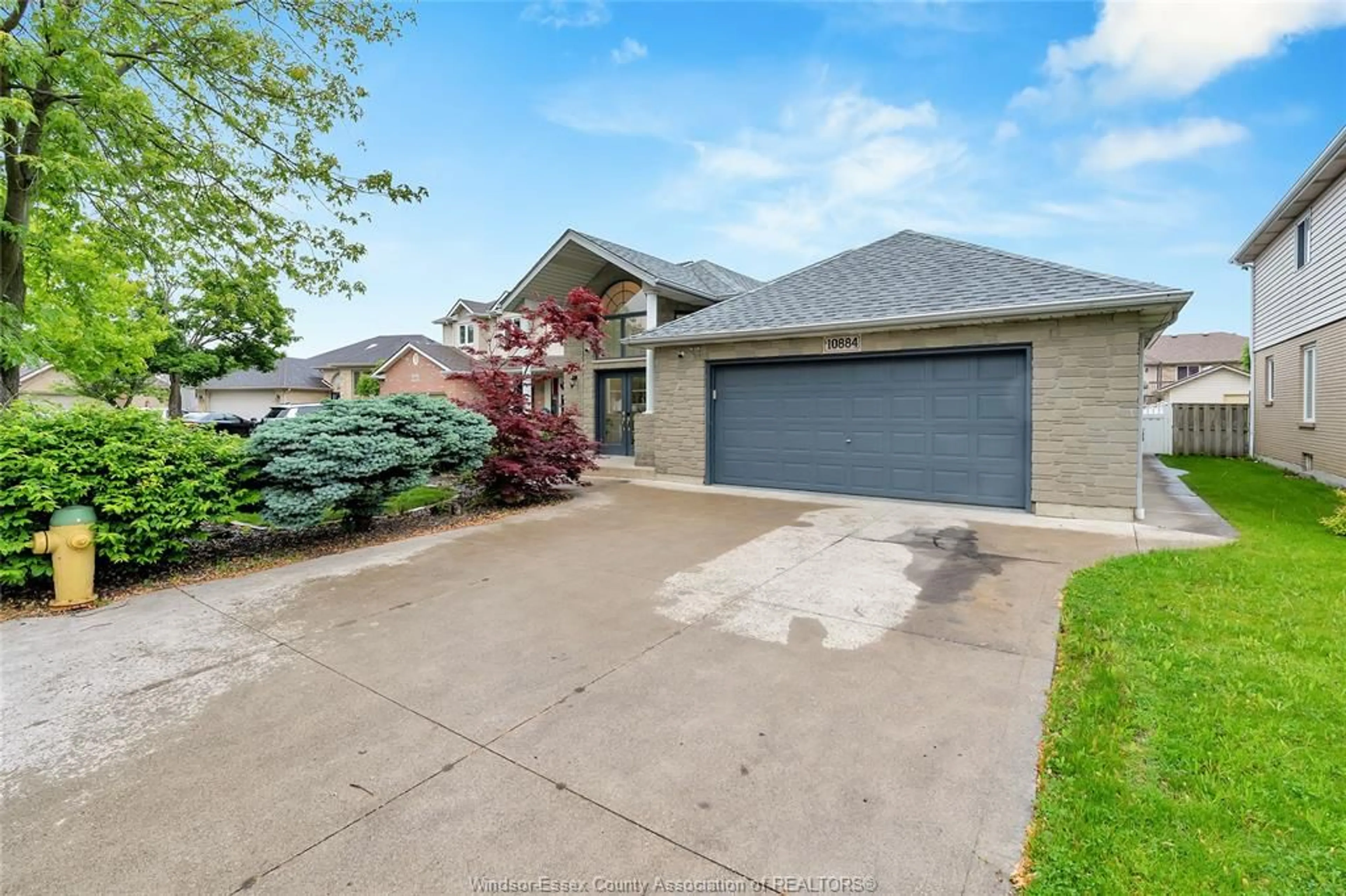 Home with brick exterior material, street for 10884 BRENTWOOD Cres, Windsor Ontario N8R 2H8