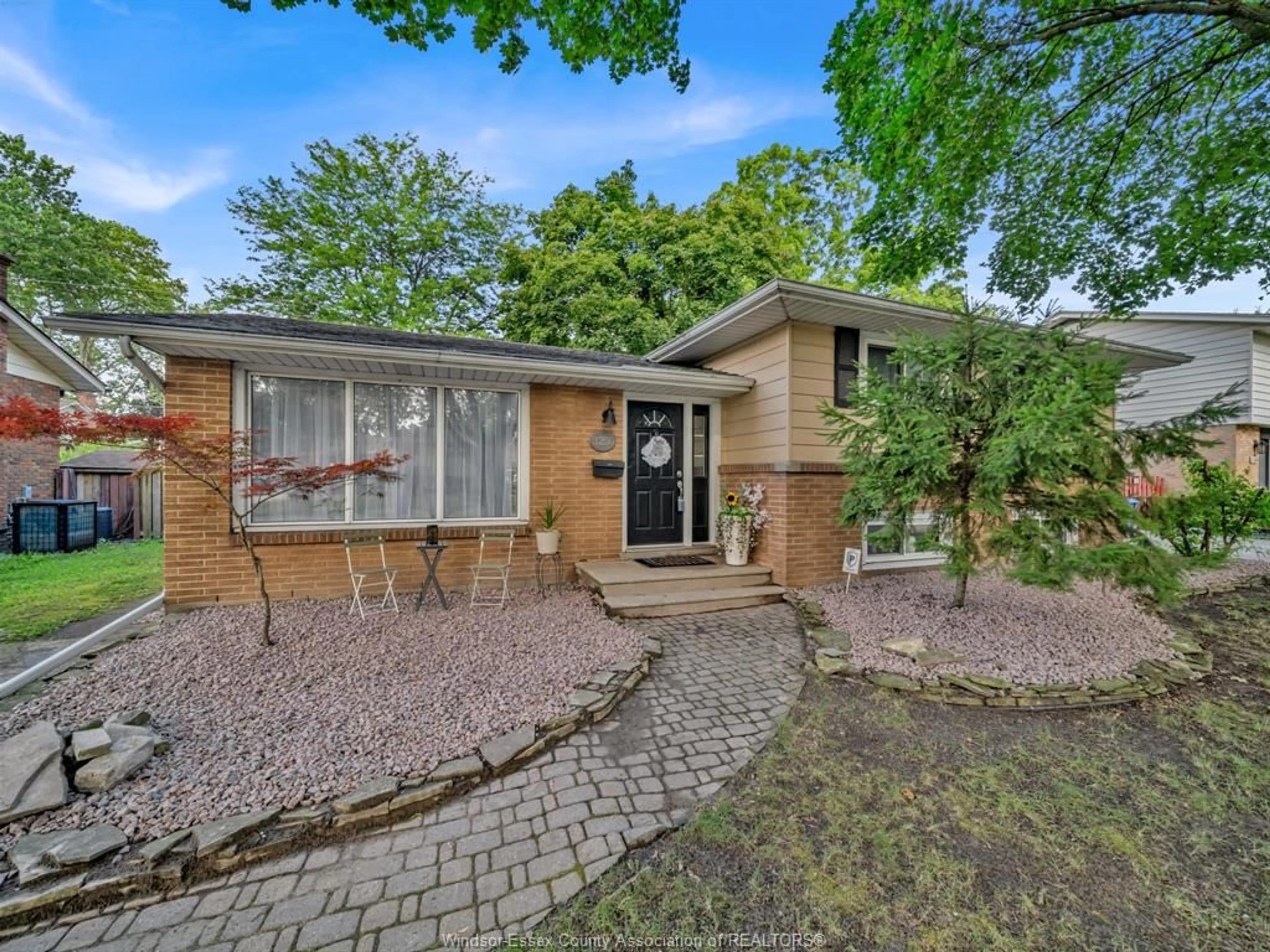 Home with brick exterior material, street for 3250 ST. PATRICKS Dr, Windsor Ontario N9E 3H3