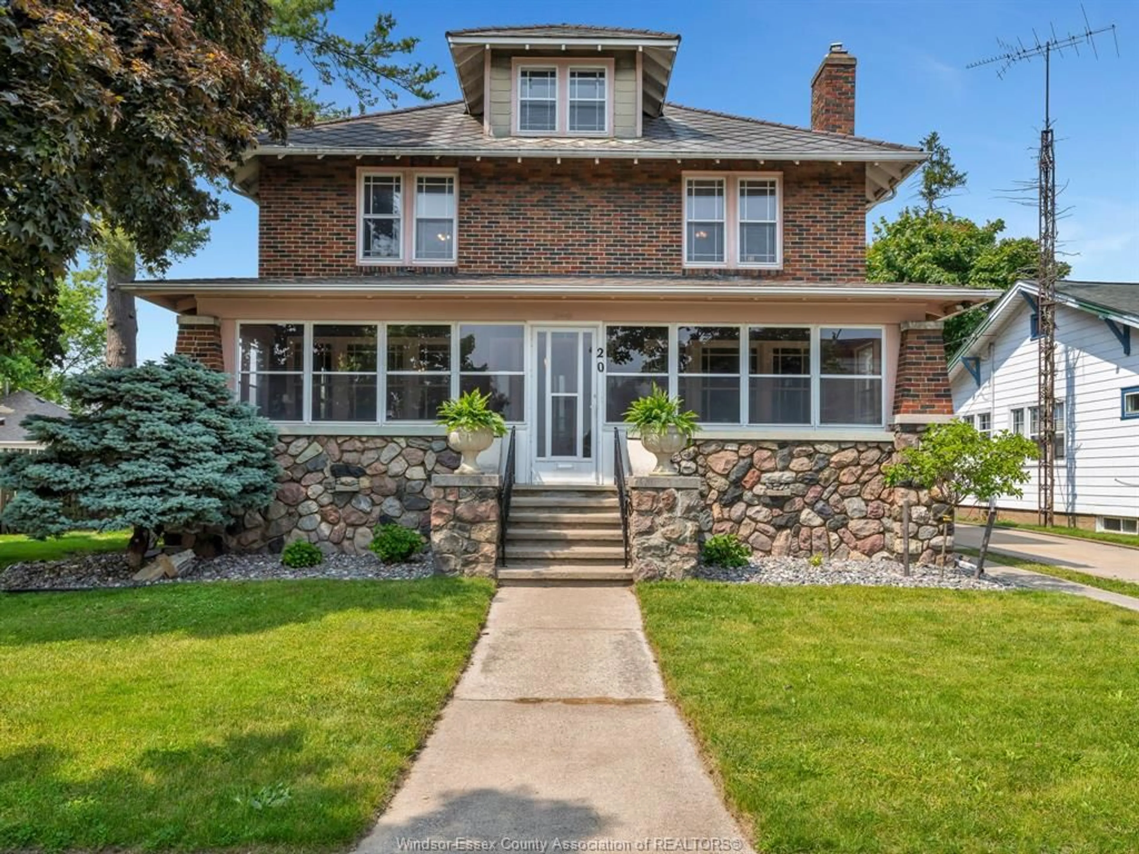 Home with brick exterior material, street for 20 MILL St, Kingsville Ontario N9Y 1V9
