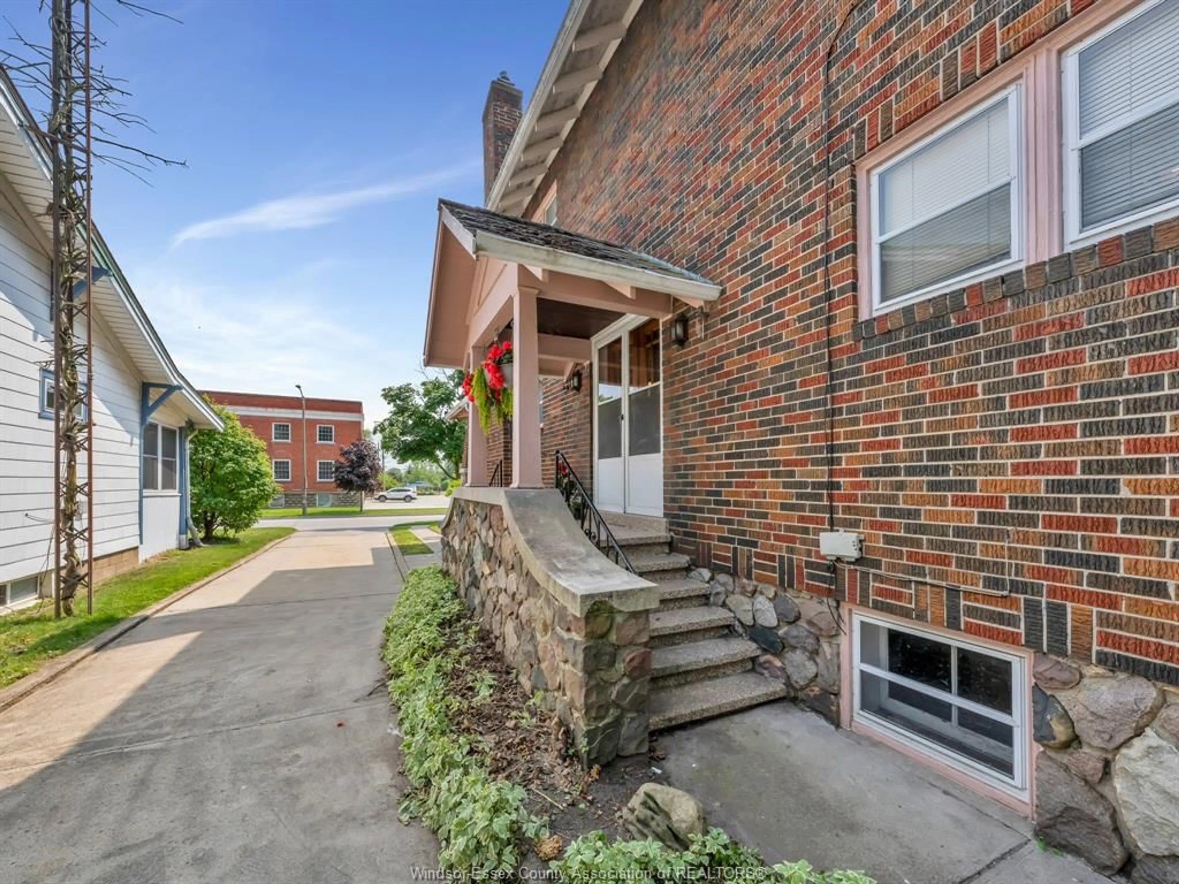 Home with brick exterior material, street for 20 MILL St, Kingsville Ontario N9Y 1V9