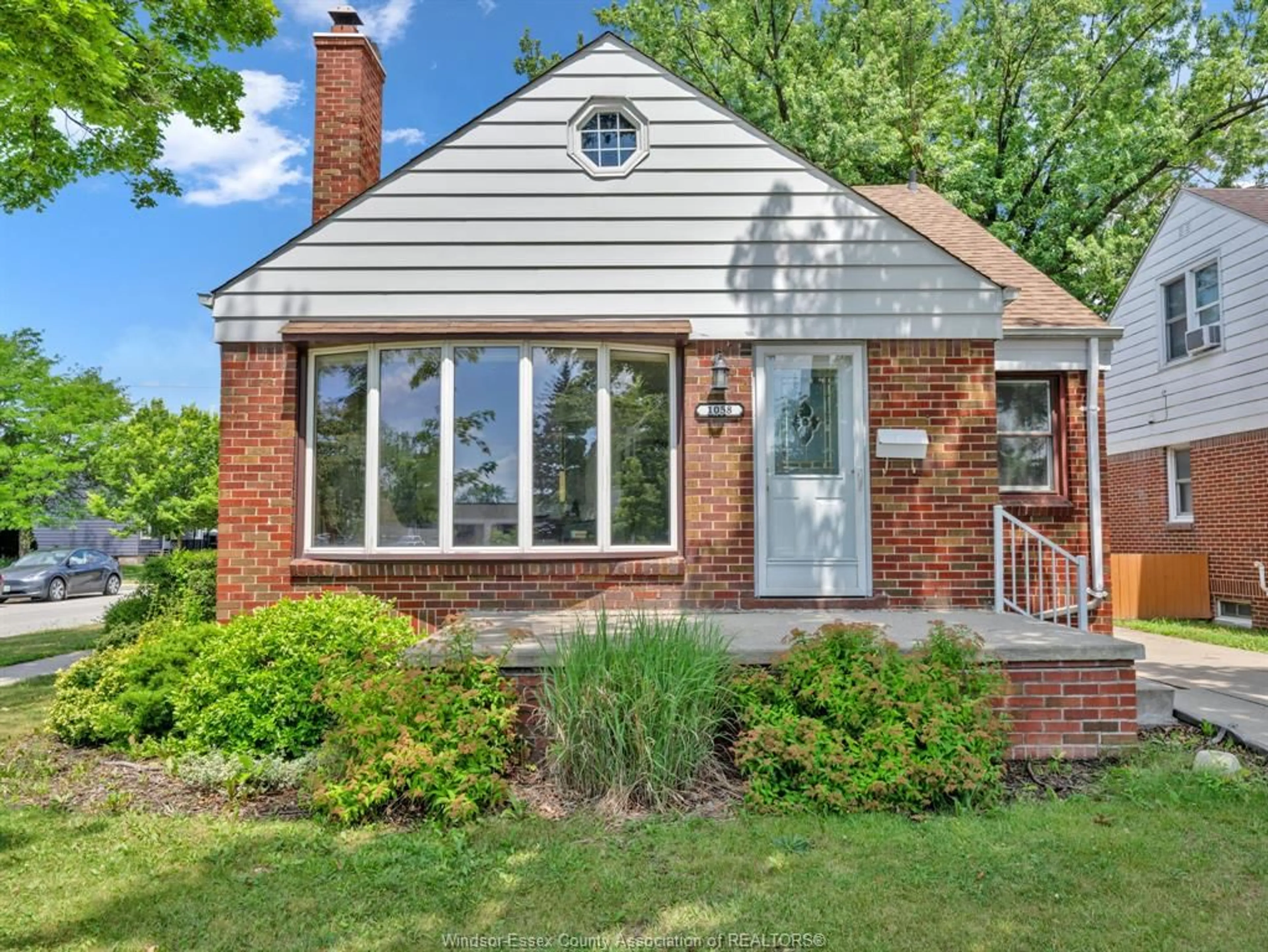 Home with brick exterior material, street for 1058 YPRES Ave, Windsor Ontario N8W 1R3