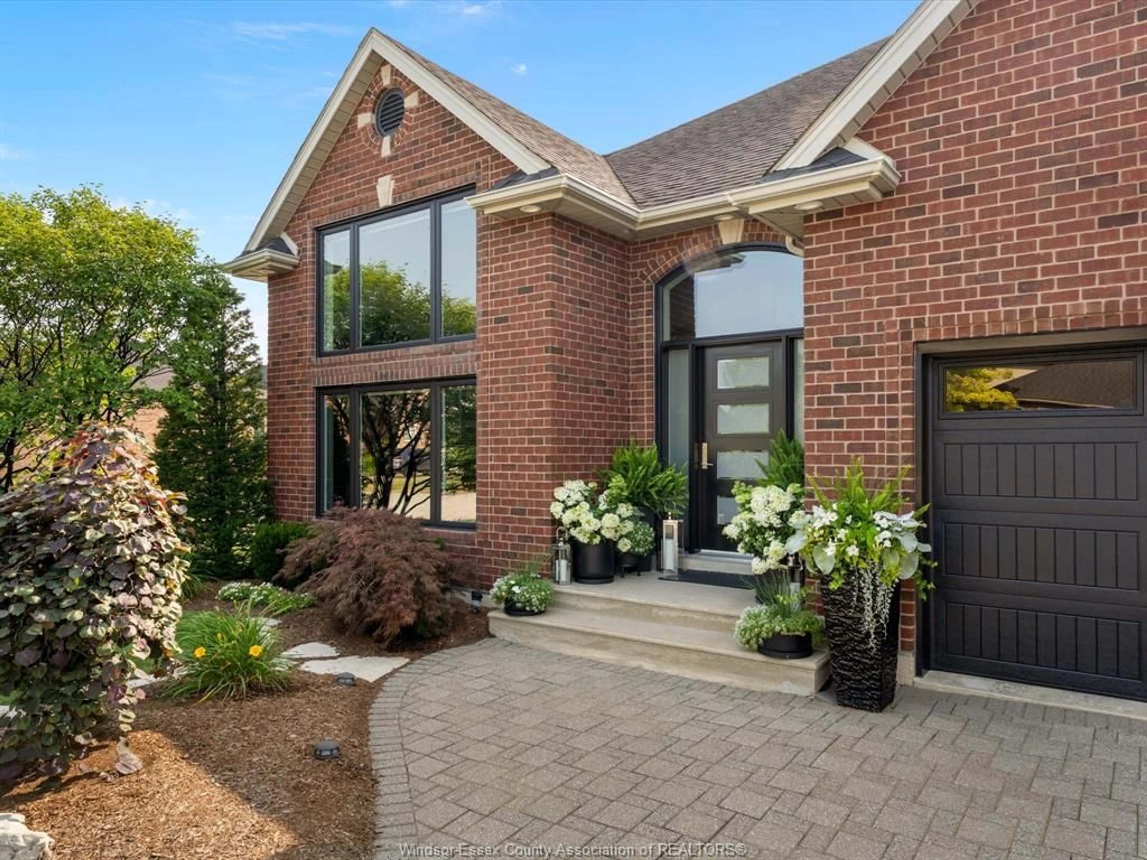 Home with brick exterior material, street for 208 LAURENDALE Dr, Lakeshore Ontario N8N 5C3