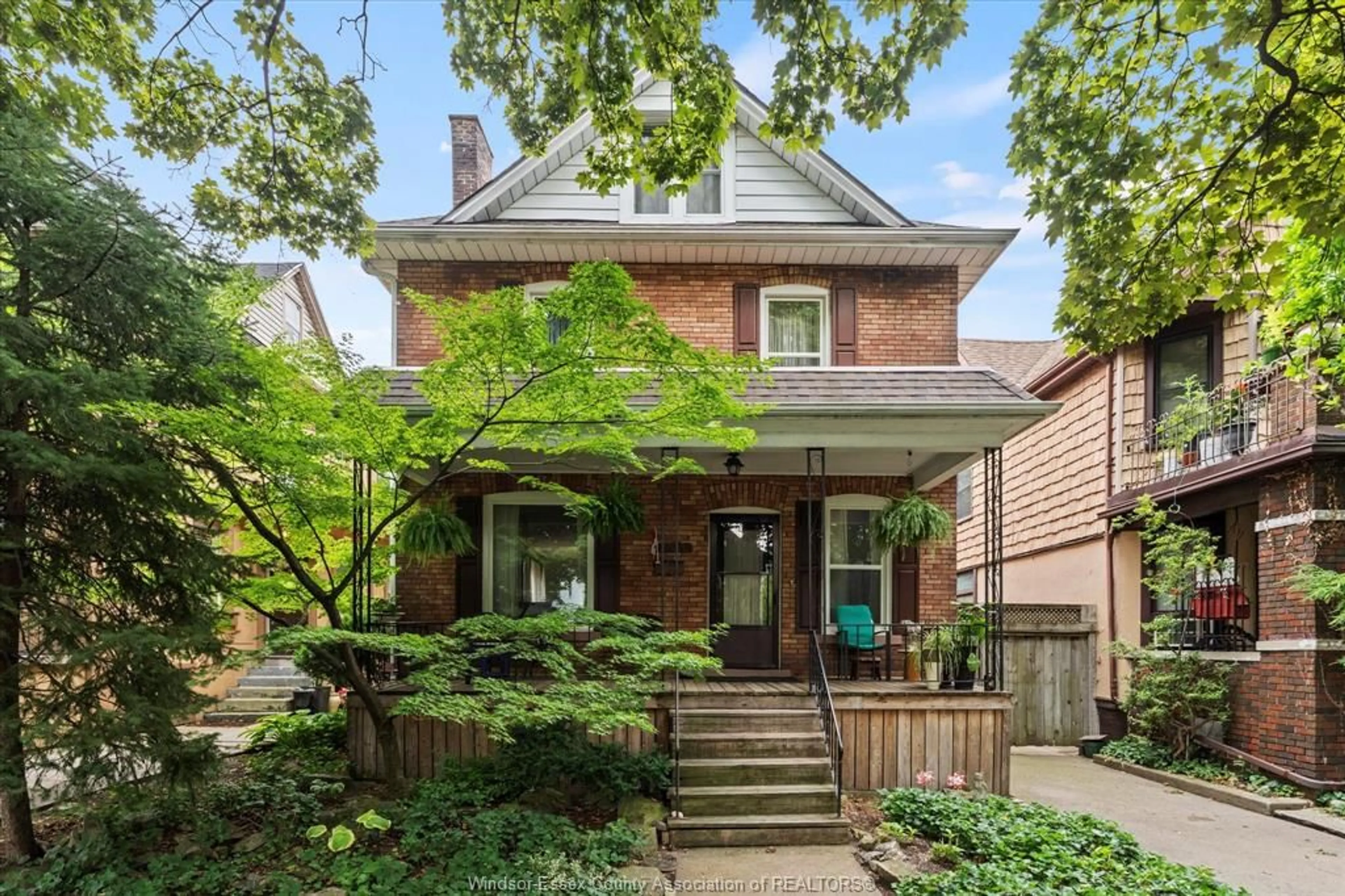 Home with brick exterior material, street for 671 WINDERMERE Rd, Windsor Ontario N8Y 3E2