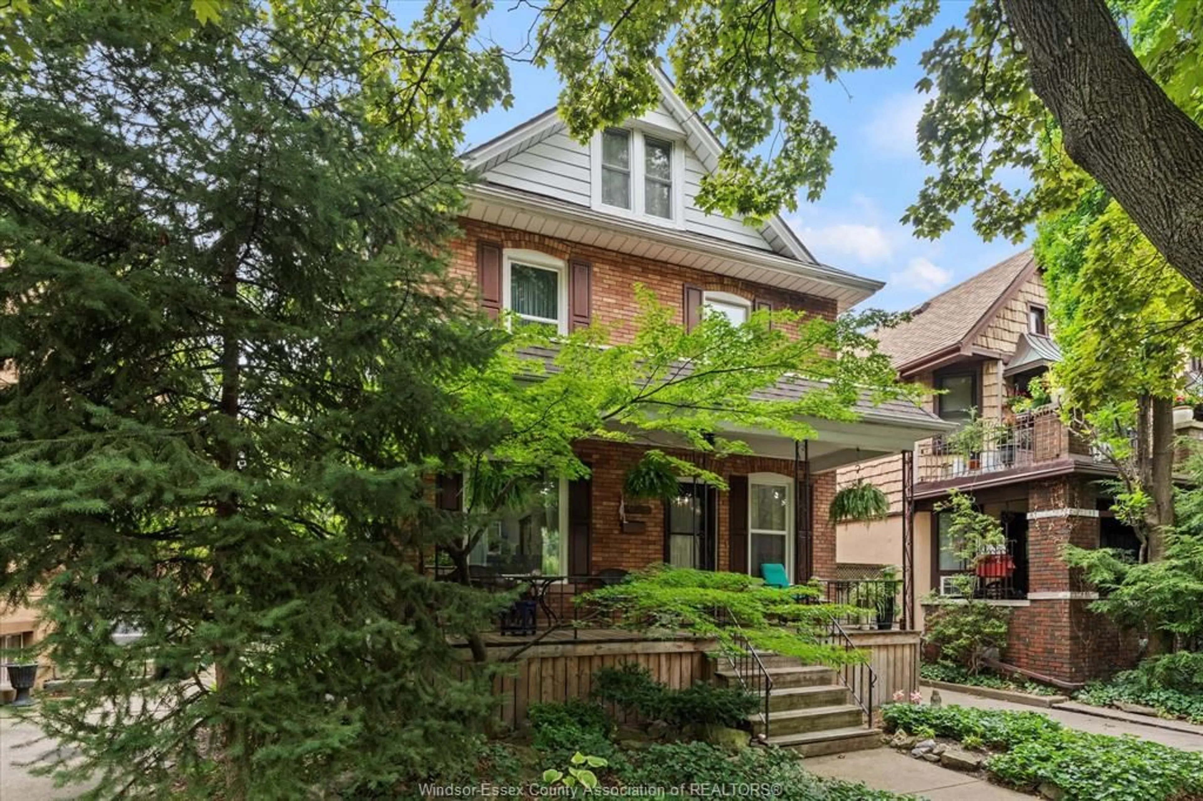 Home with brick exterior material, street for 671 WINDERMERE Rd, Windsor Ontario N8Y 3E2