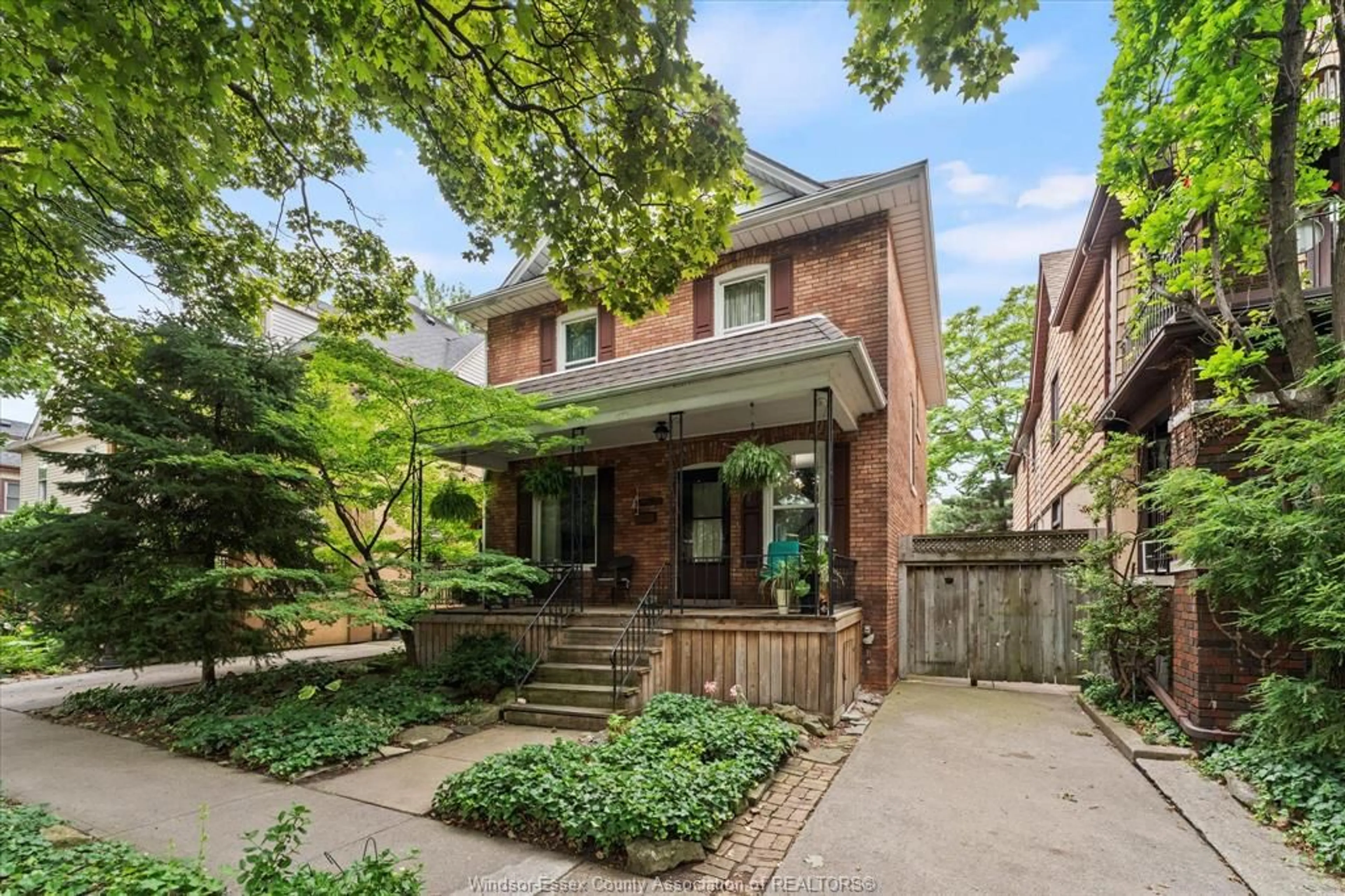 Home with brick exterior material, street for 671 WINDERMERE Rd, Windsor Ontario N8Y 3E2