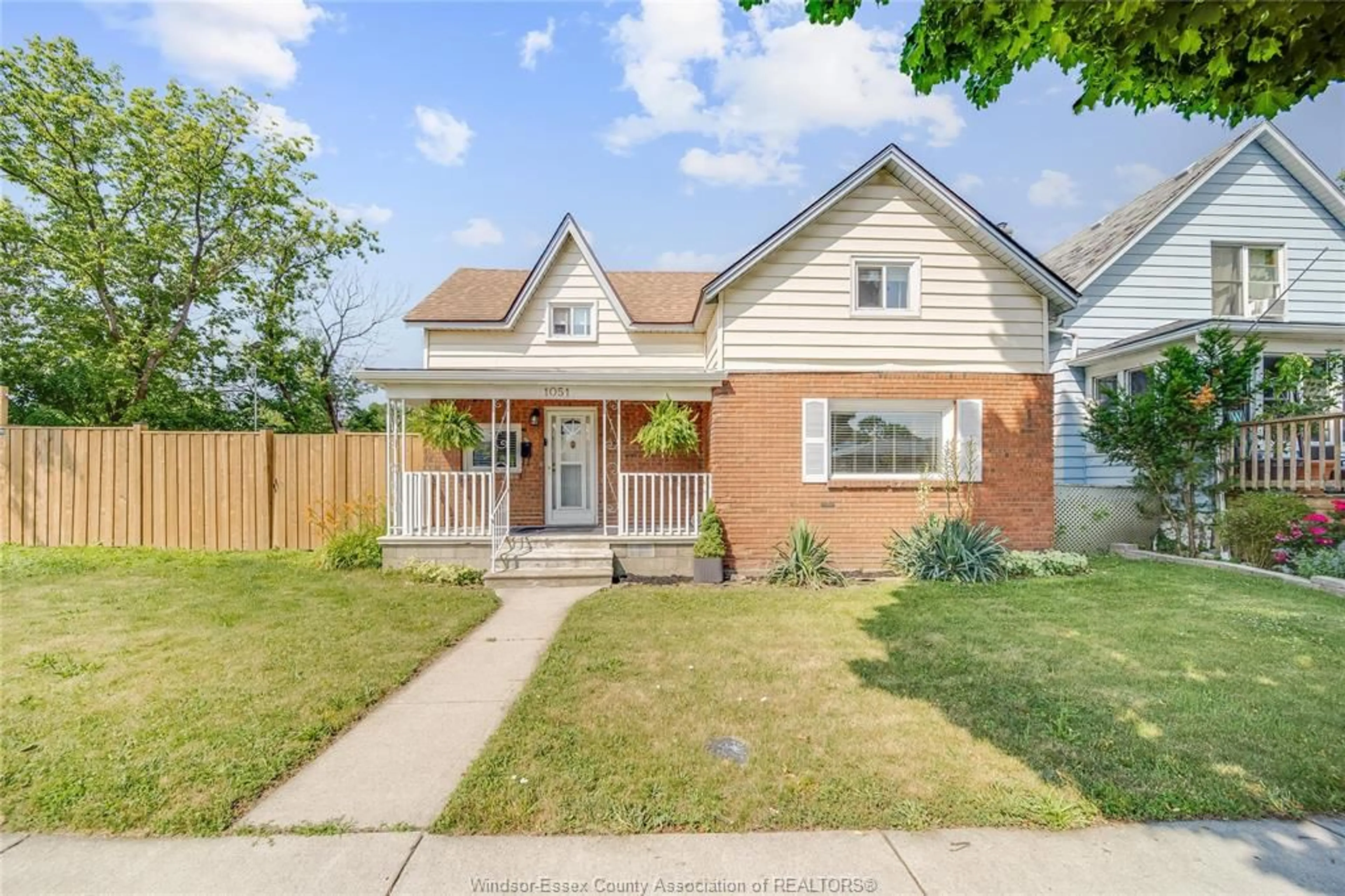 Home with brick exterior material, street for 1051 PILLETTE Rd, Windsor Ontario N8Y 3B7